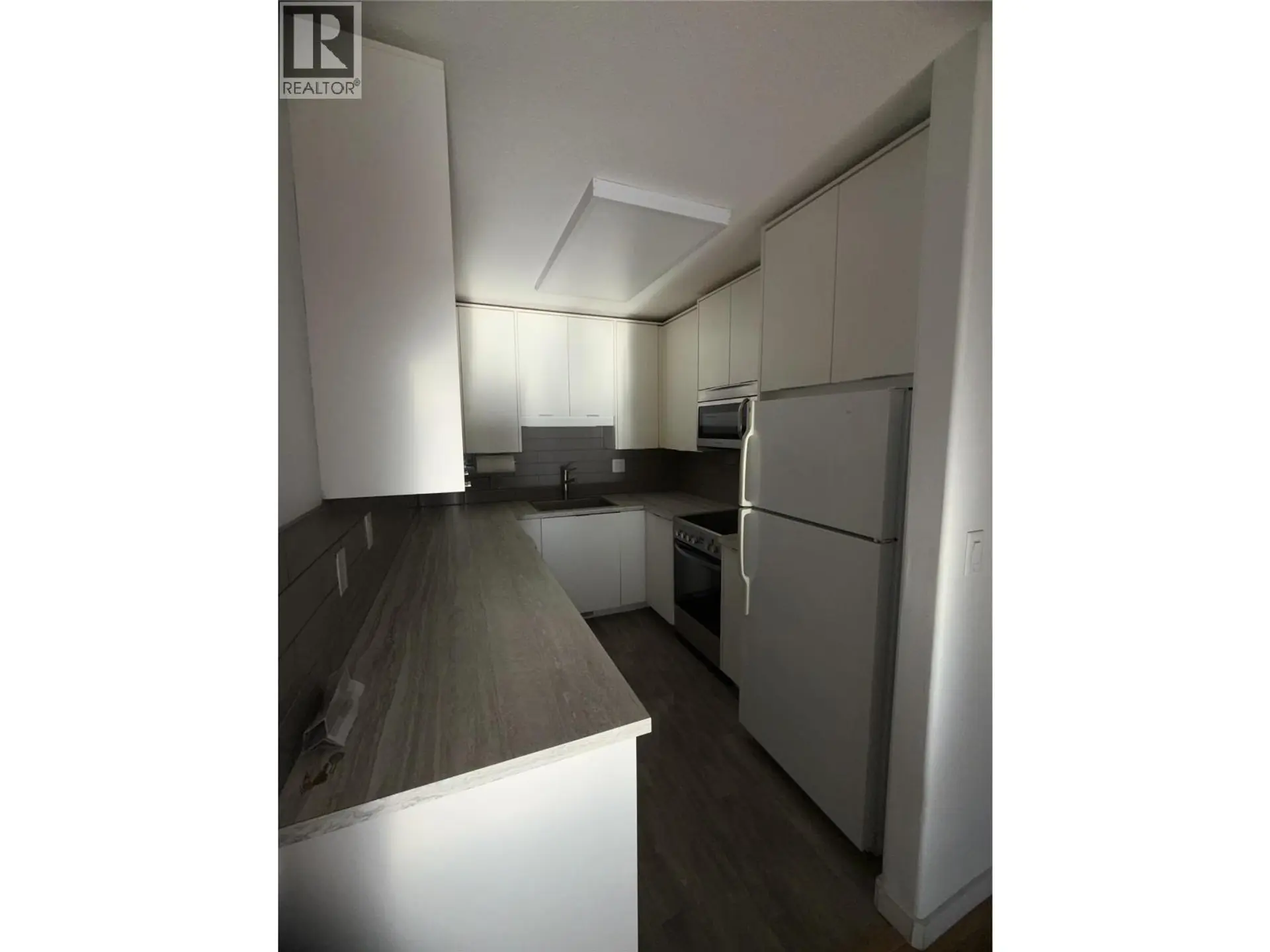 Property at #207 3155 GORDON DRIVE, Kelowna, BC