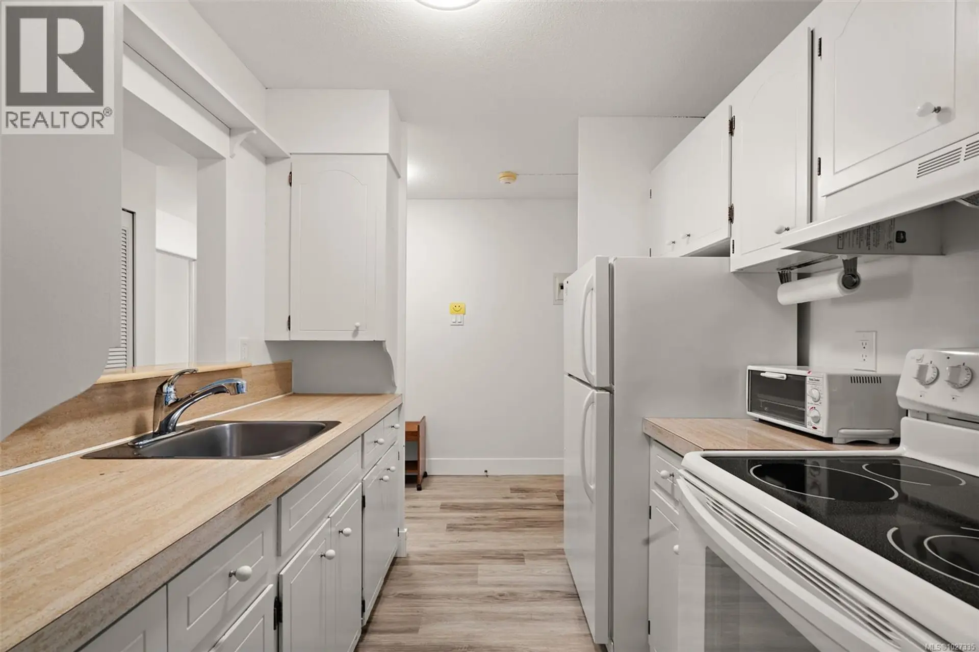 Property at #206 2050 WHITE BIRCH RD, Sidney, BC