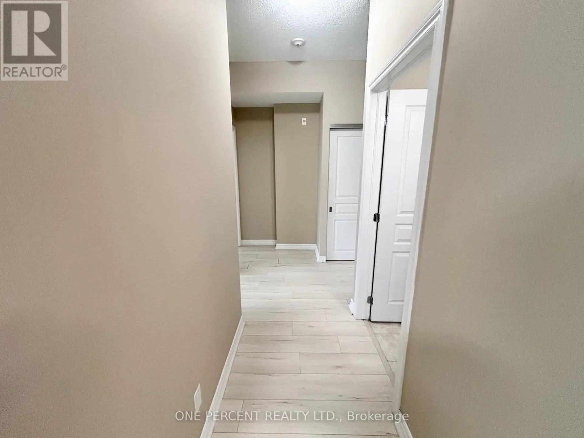 #201 100 ROGER GUINDON AVENUE - Image 2