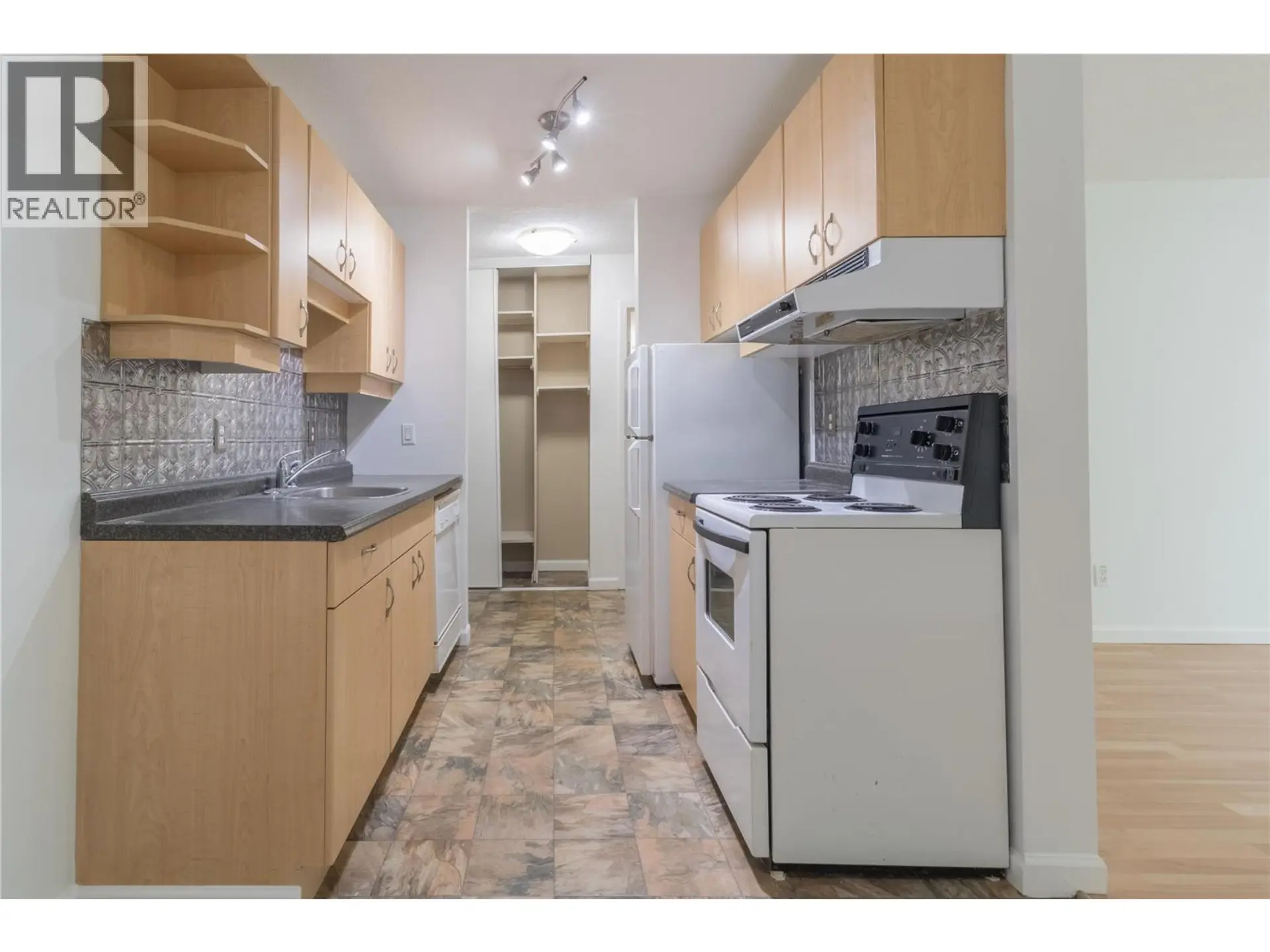 Property at #106 445 ALL STAR COURT, Kelowna, BC