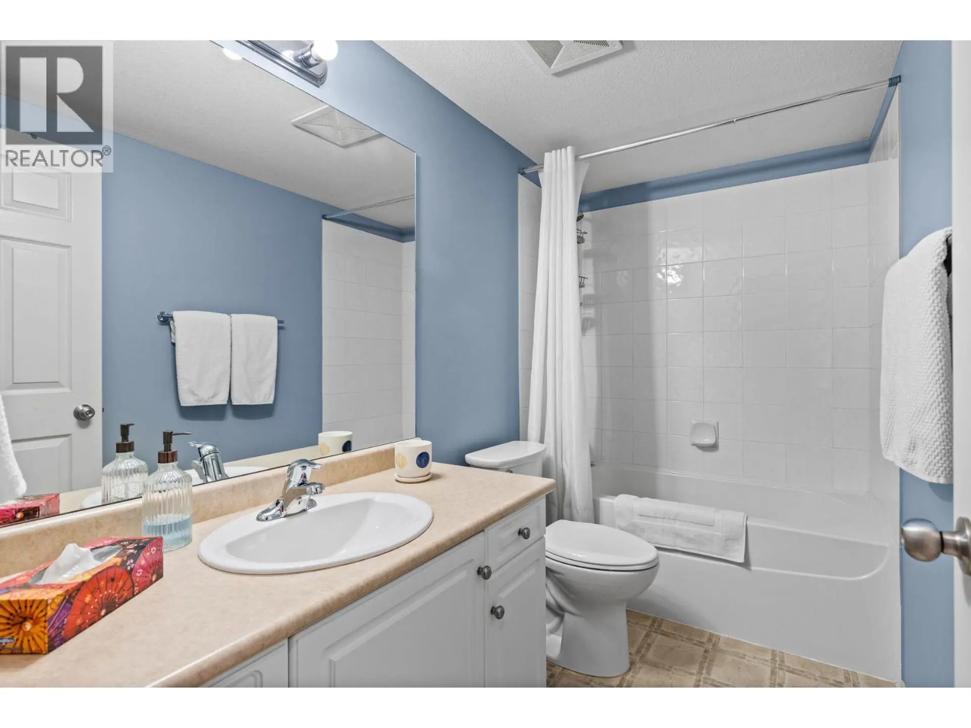 Property at #208 1088 SUNSET DRIVE, Kelowna, BC