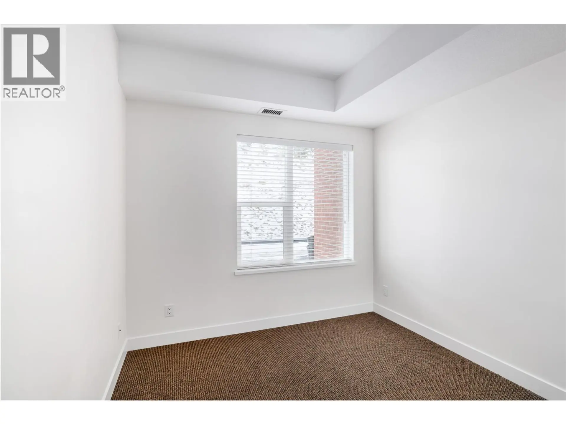 Property at #214 975 Academy Way, Kelowna, BC