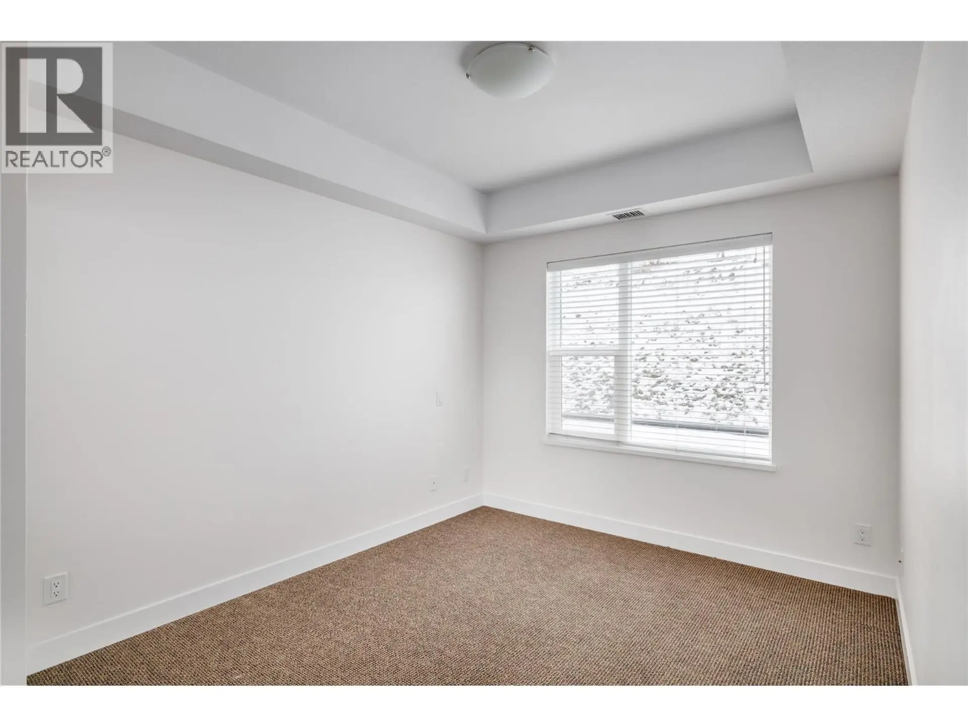 Property at #214 975 Academy Way, Kelowna, BC