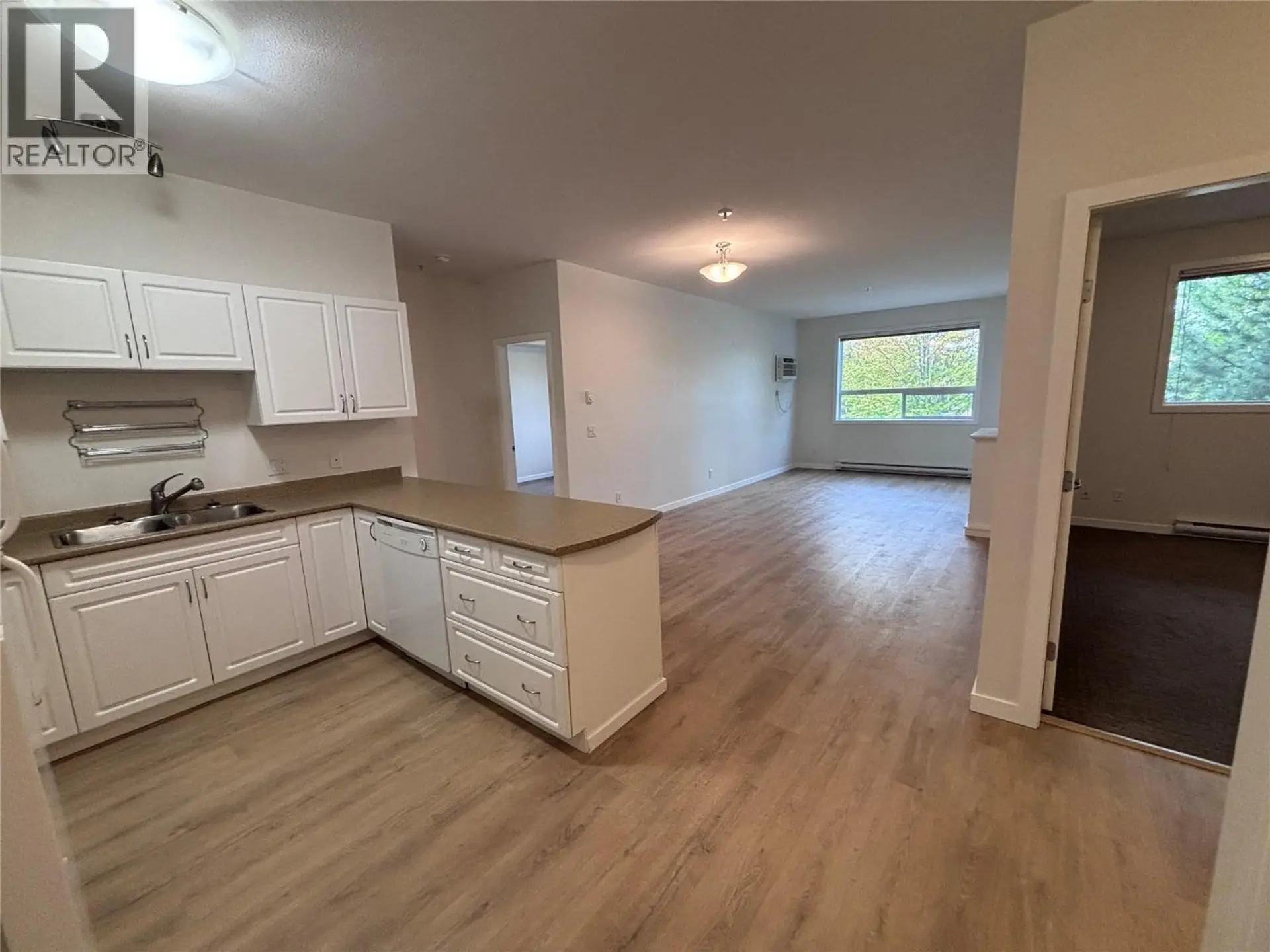 #210 778 Rutland Road N - Image 2