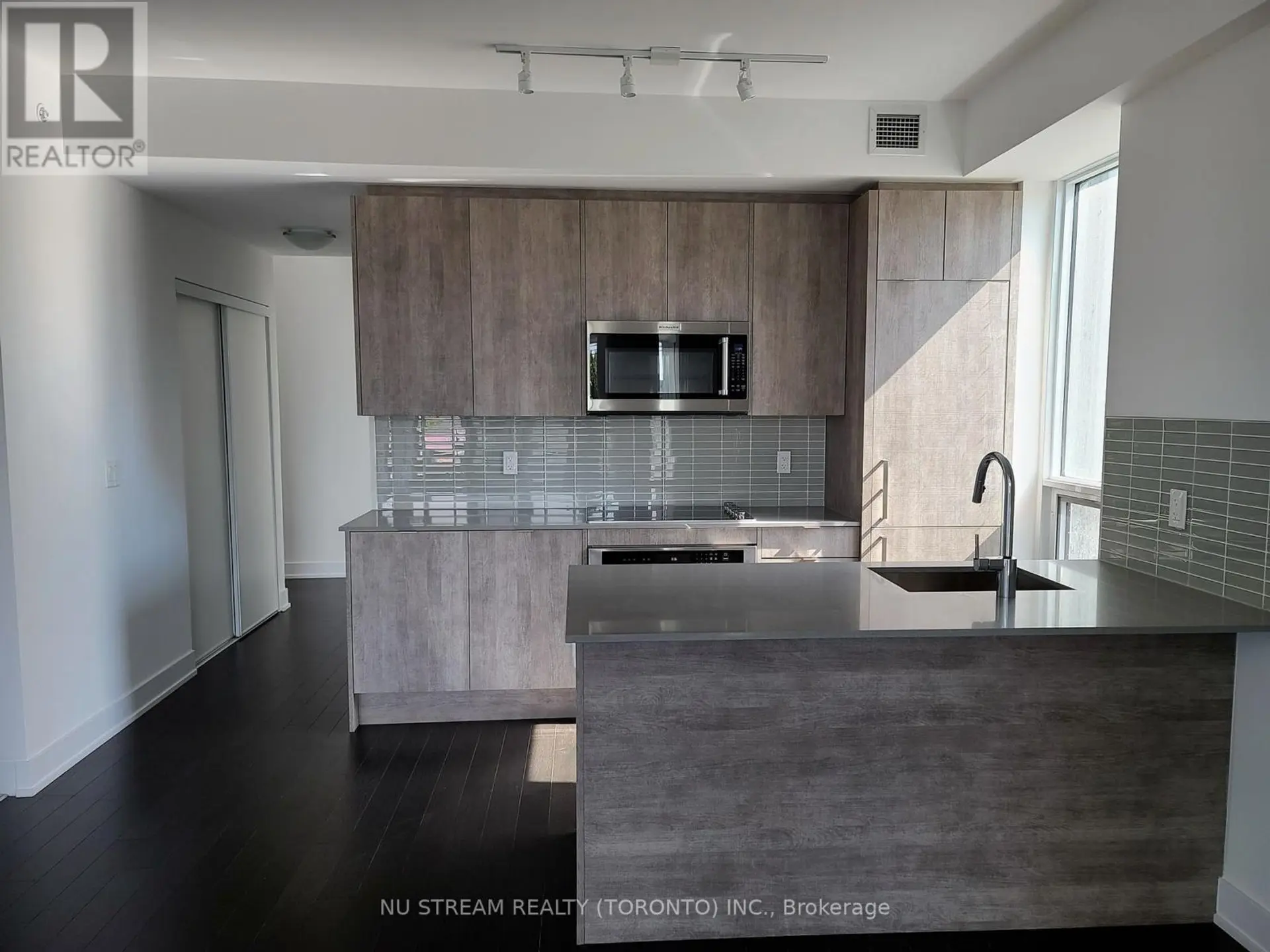 #307 181 BEDFORD ROAD - Image 1