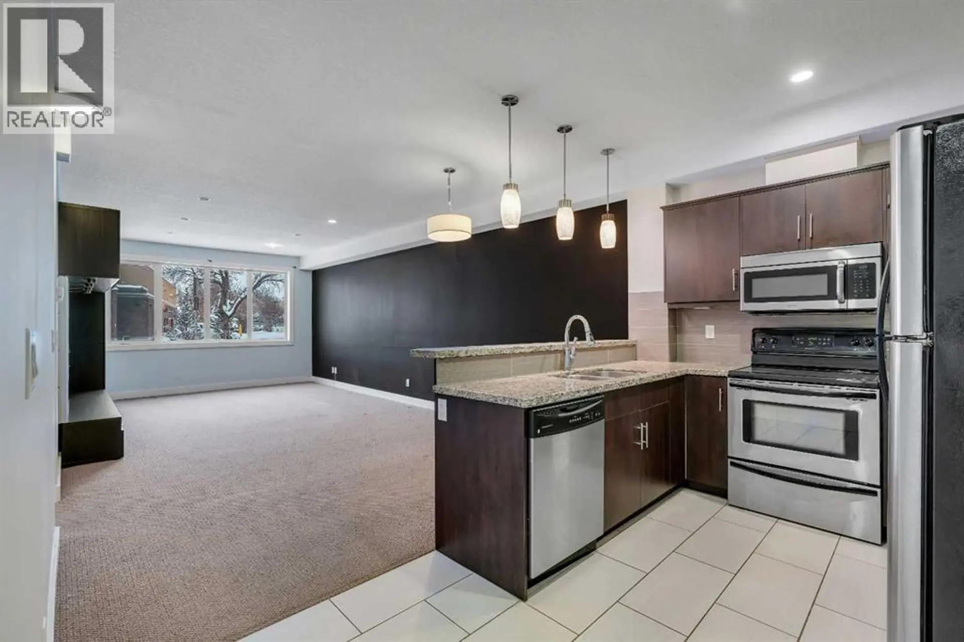 #105 320 12 Avenue NE - Image 2