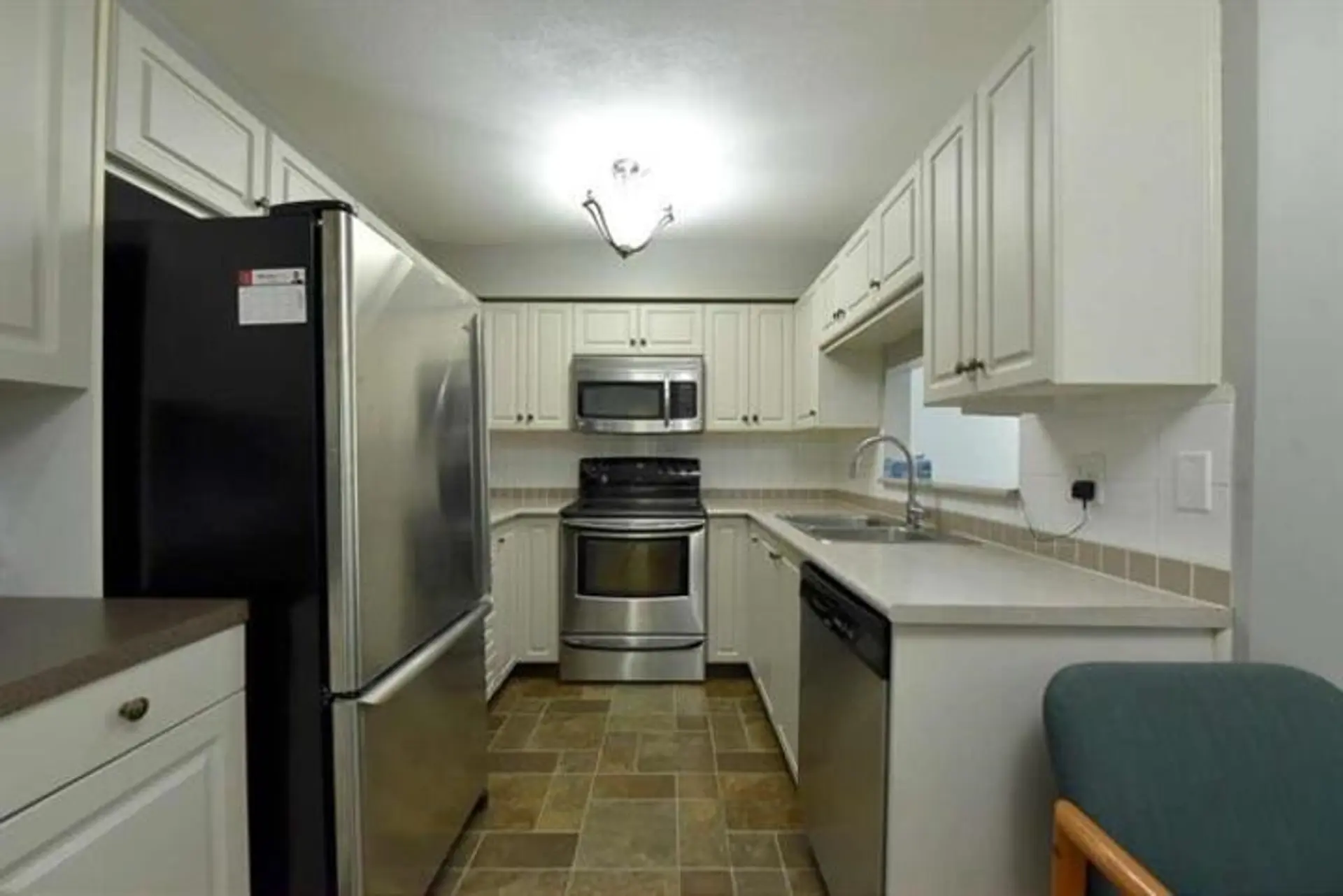 Property at #106 9865 140 Street, Surrey, BC