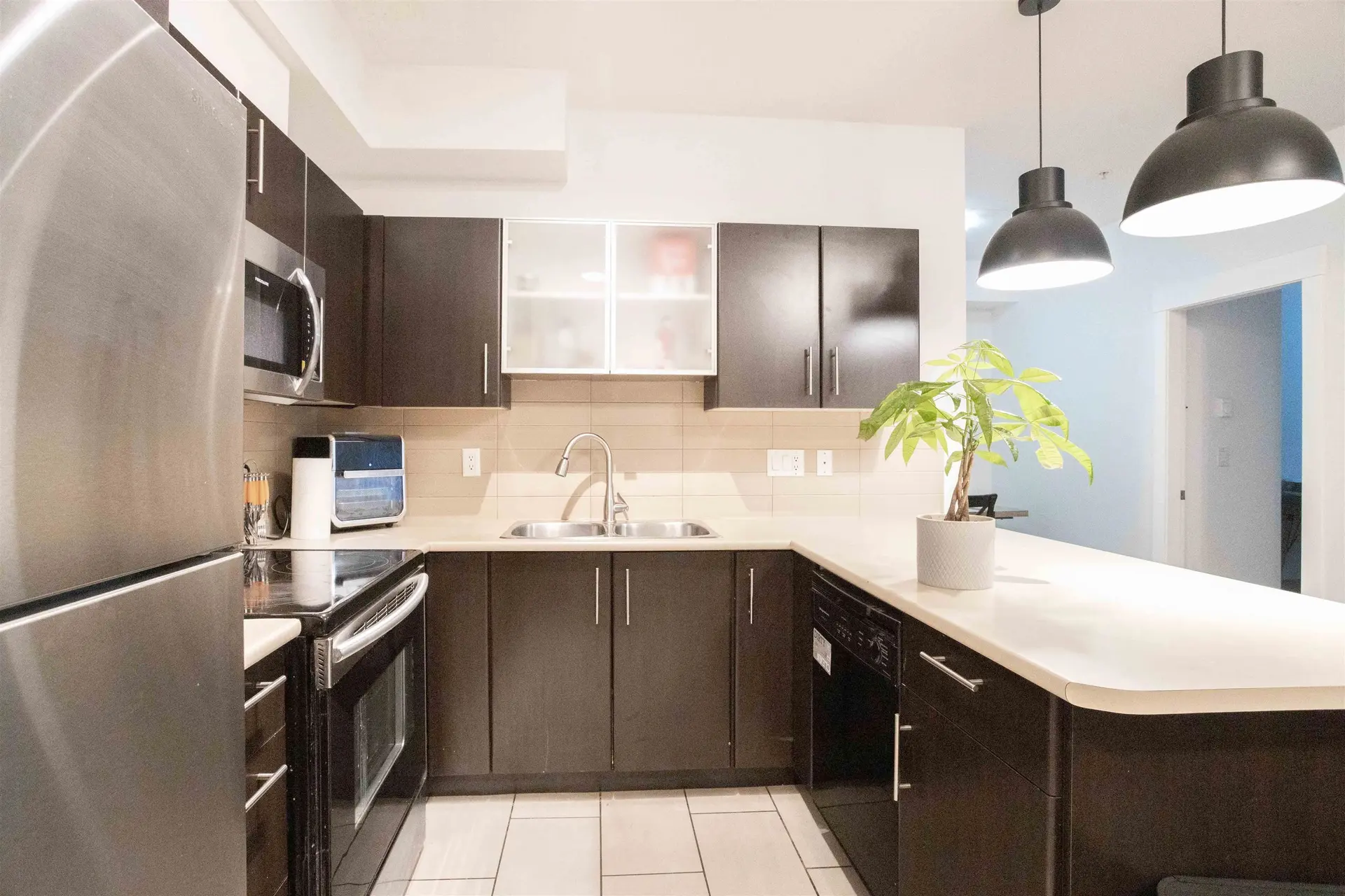 #210 33545 Rainbow Avenue - Image 2