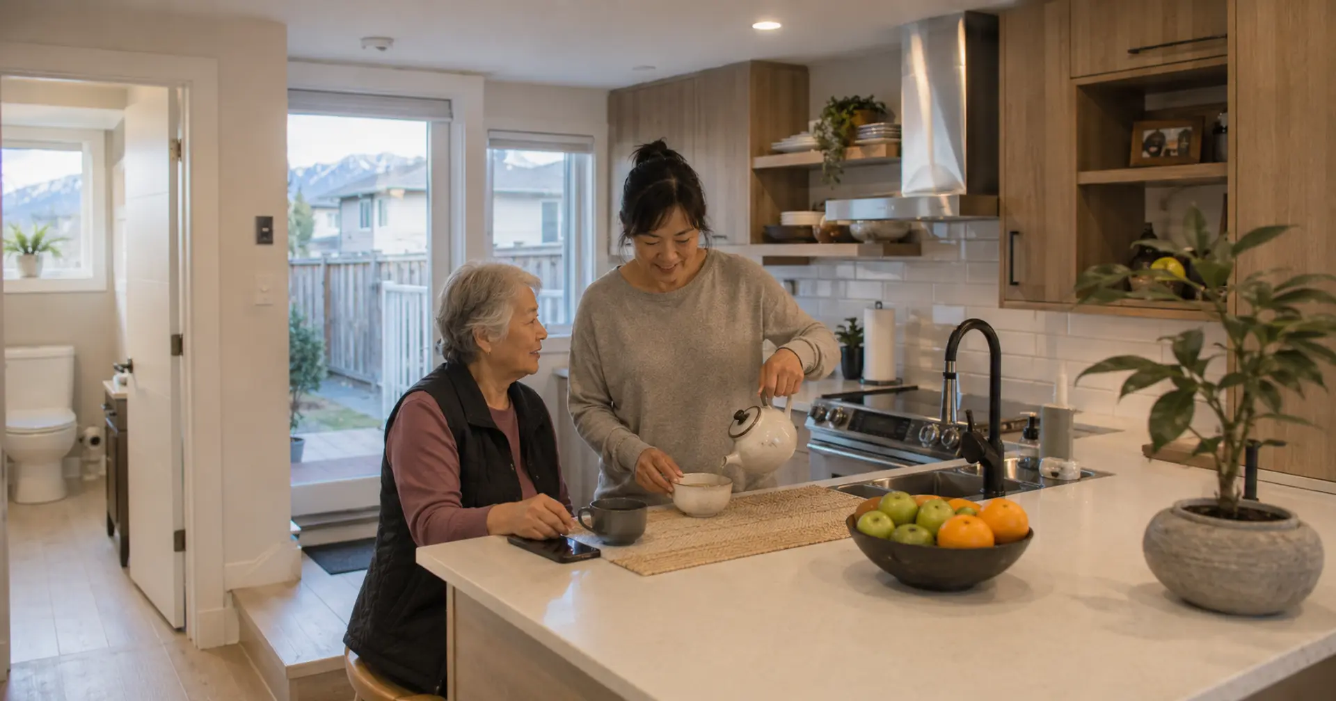 Senior mother and adult daughter in a basement secondary suite in a BC home