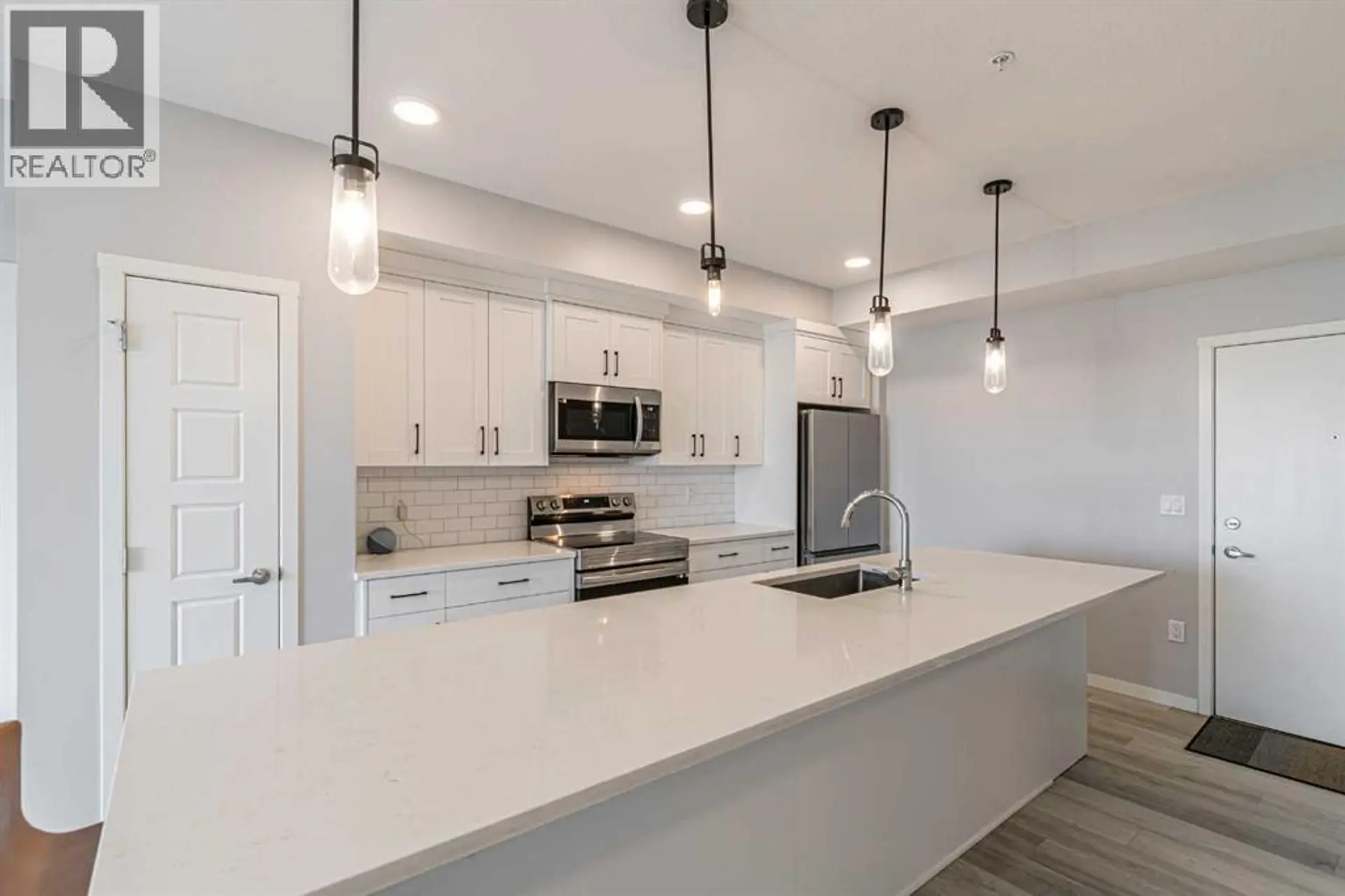 #203 360 HARVEST HILLS WAY NE - Image 5