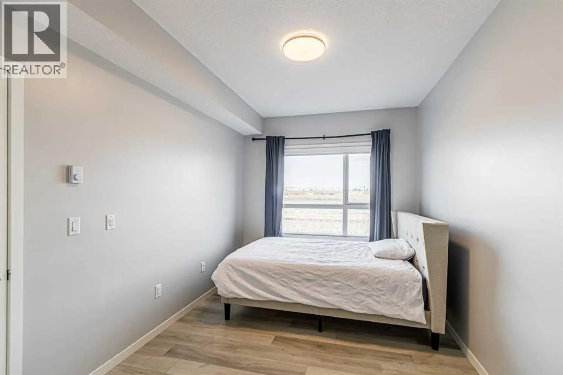 #203 360 HARVEST HILLS WAY NE - Image 10