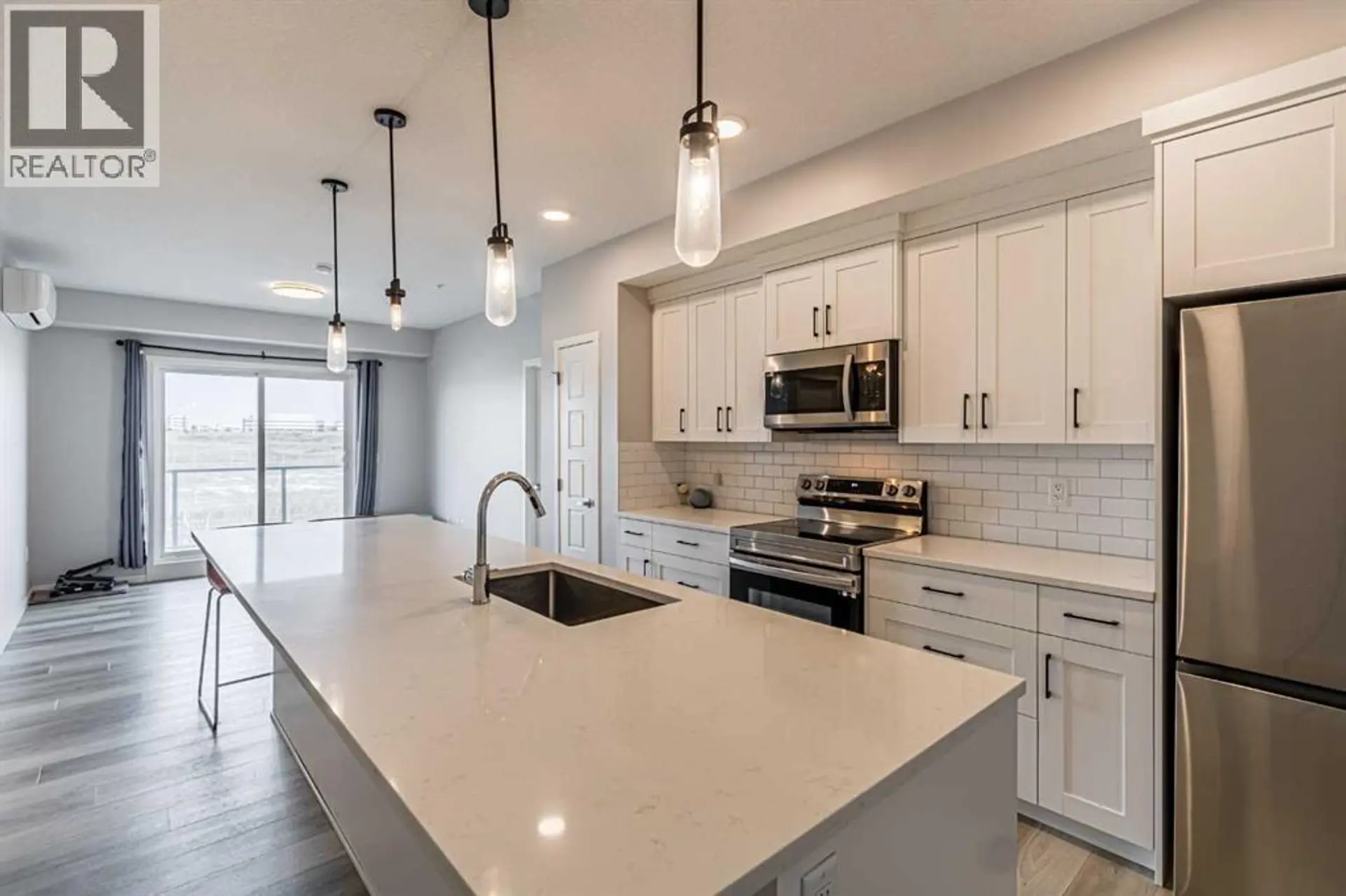 #203 360 HARVEST HILLS WAY NE - Image 3