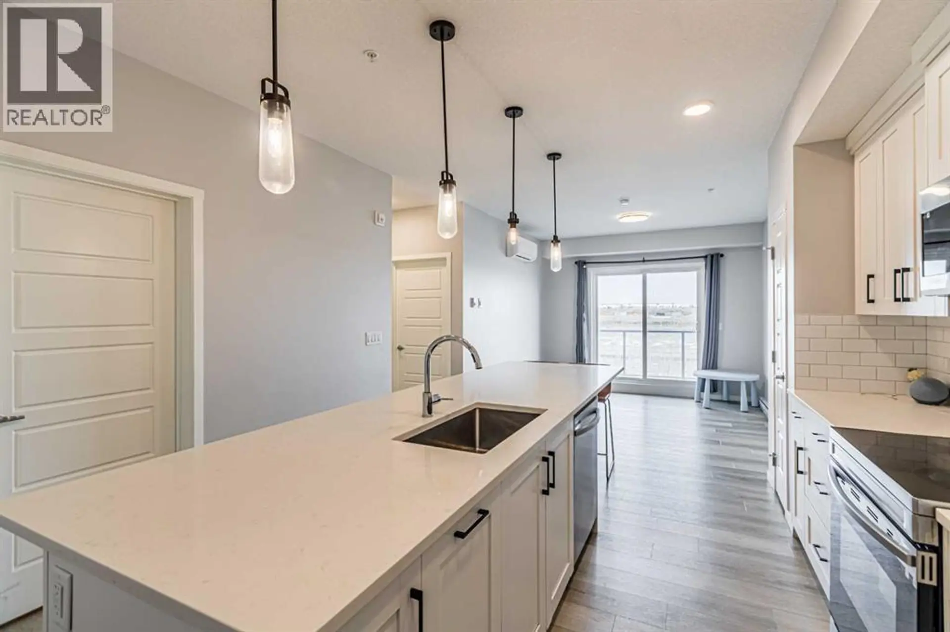 #203 360 HARVEST HILLS WAY NE - Image 4