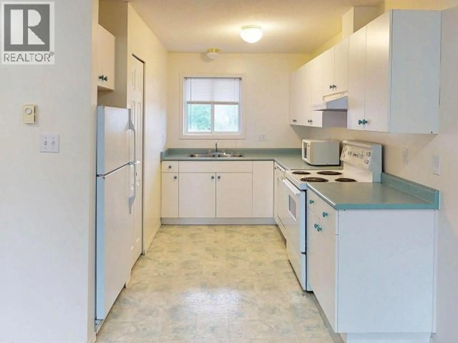 #201 5680 ORTONA AVE - Image 2
