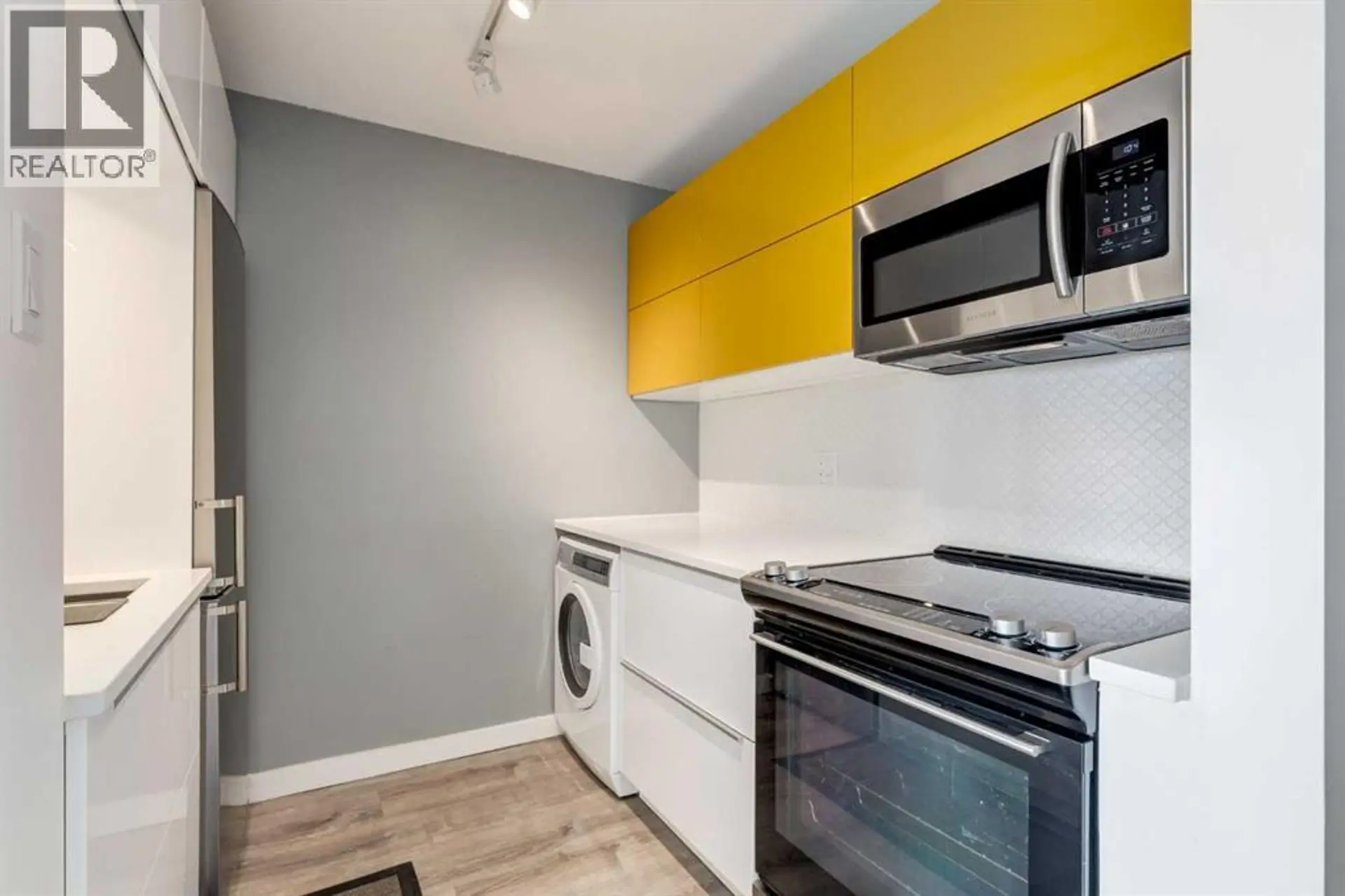 Property at #206 1513 26 Avenue SW, Calgary, AB