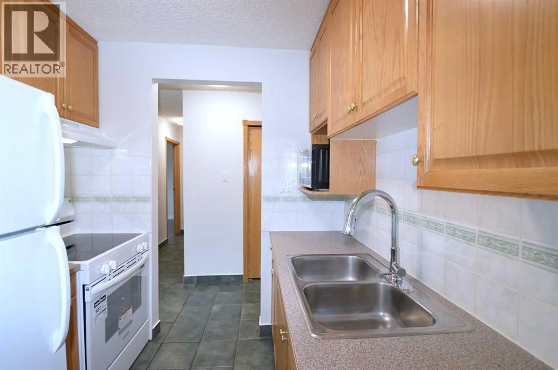 #303 635 56 Avenue SW - Image 2