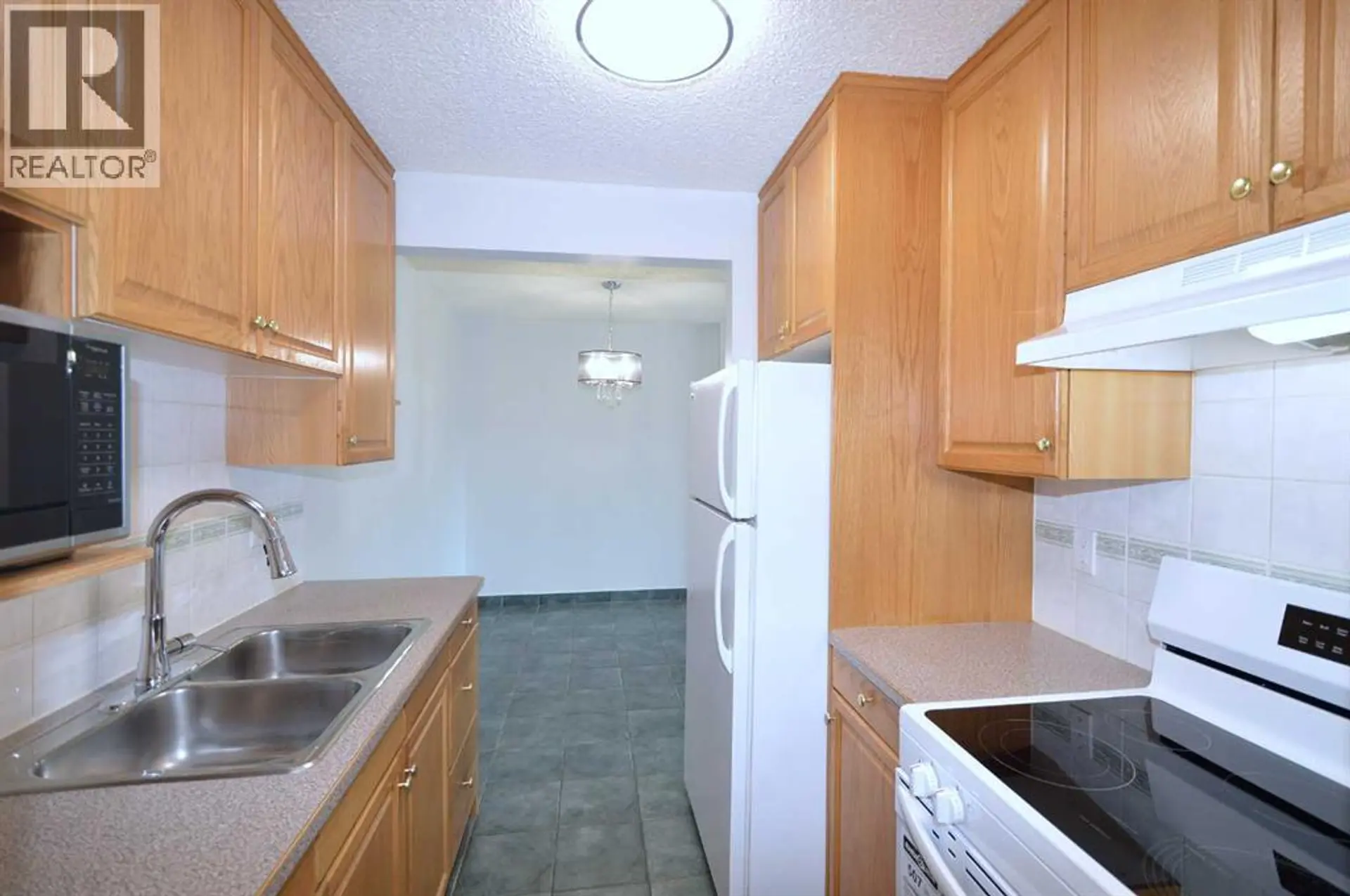 #303 635 56 Avenue SW - Image 3