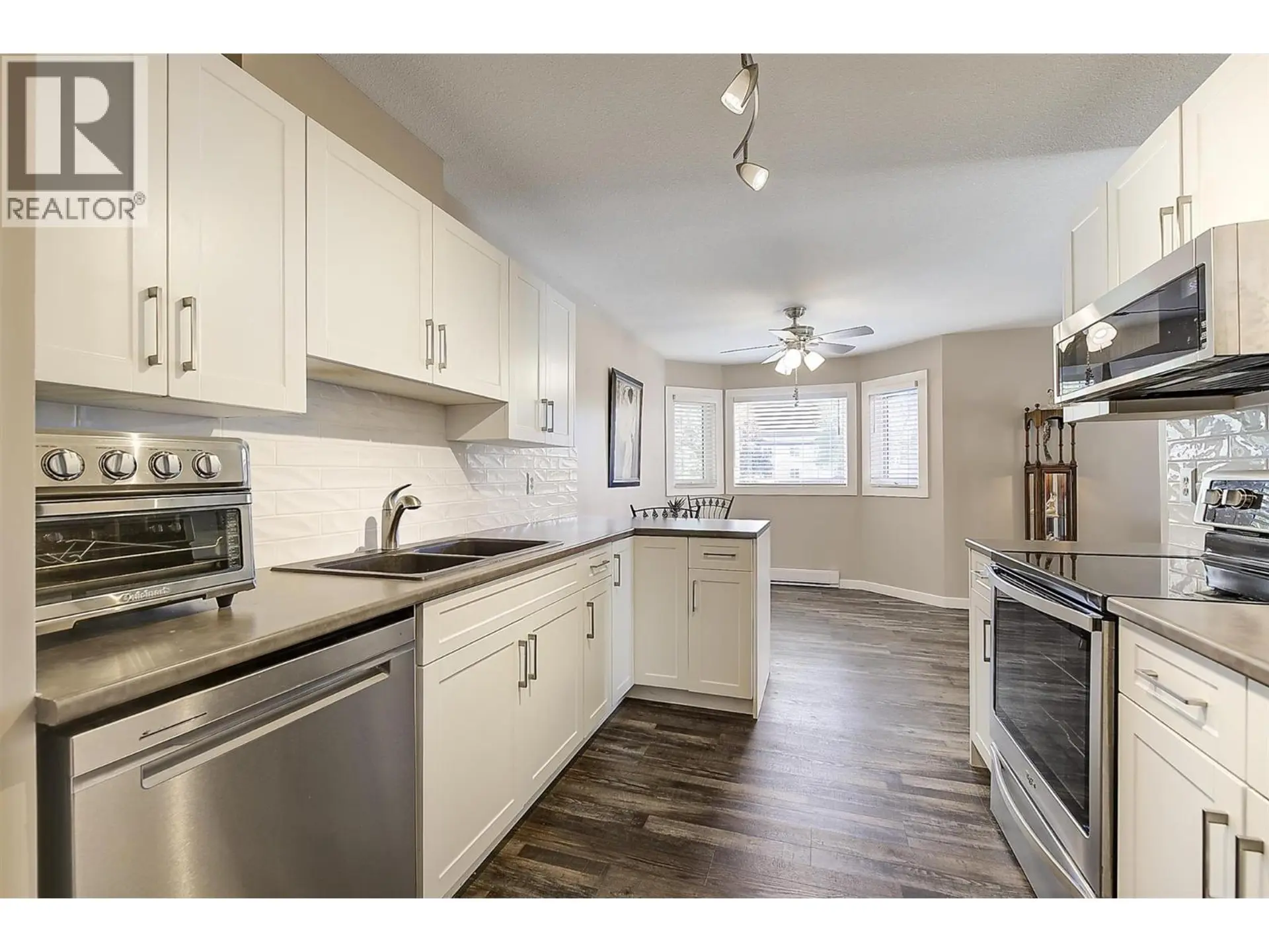 Property at #216 3842 Gordon Drive, Kelowna, BC