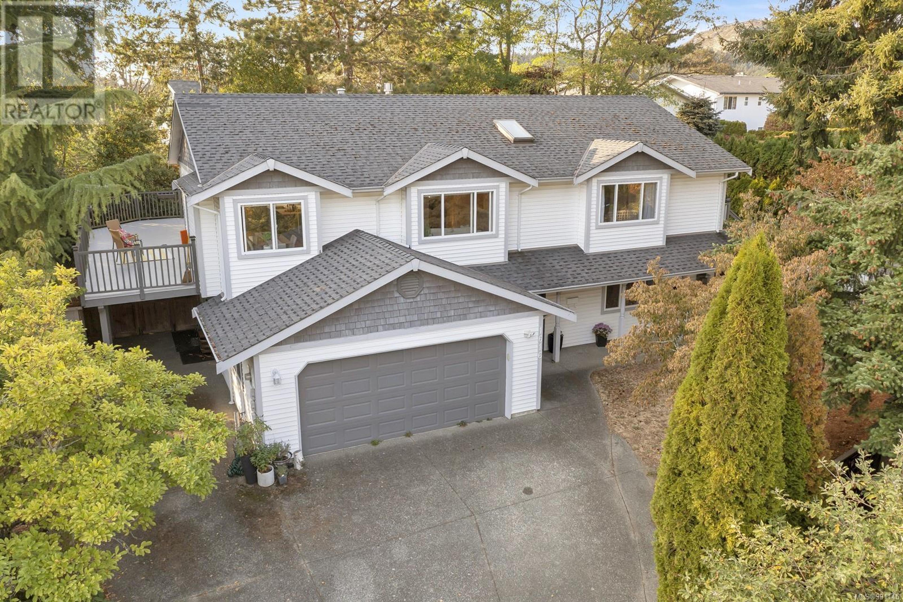 1616 Nelles Pl, Saanich - Exteriors - Drone/Aerial View - Photo 1