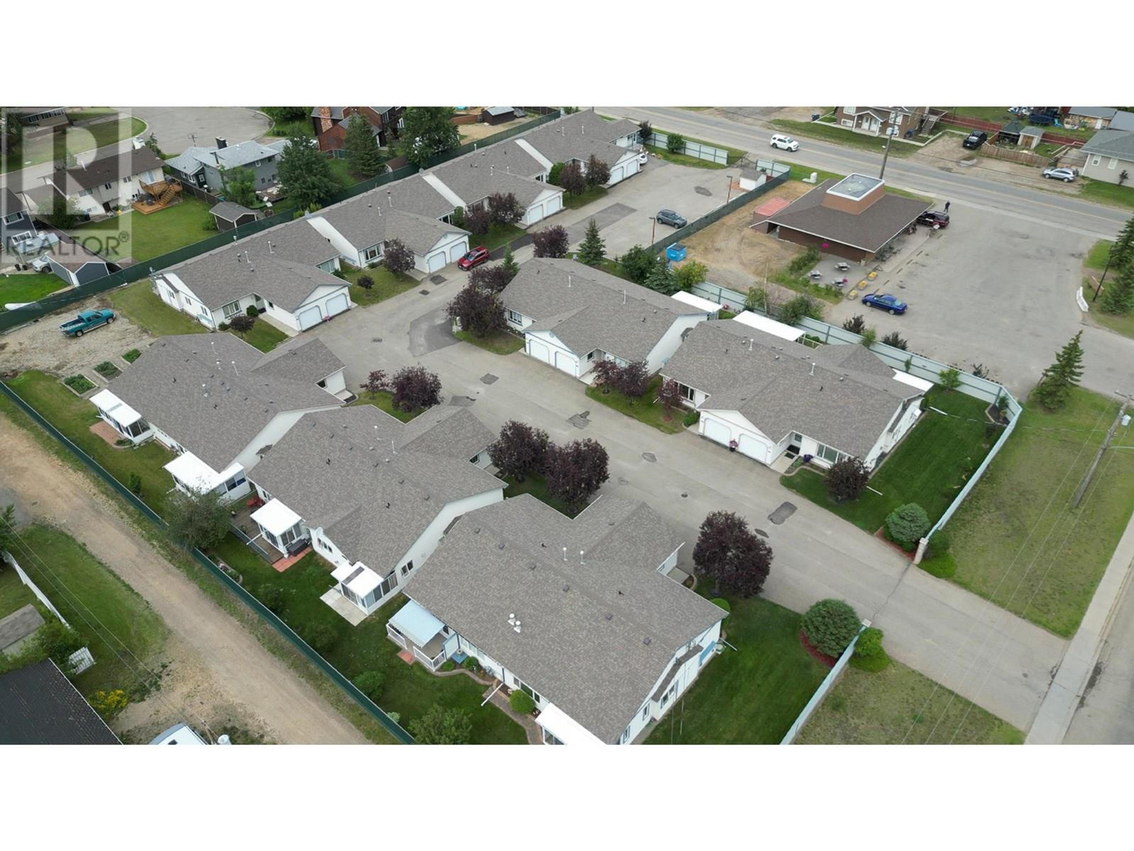 1708 108 Avenue, Dawson Creek - Exteriors - Full Complex View, Drone/Aerial View - Photo 1