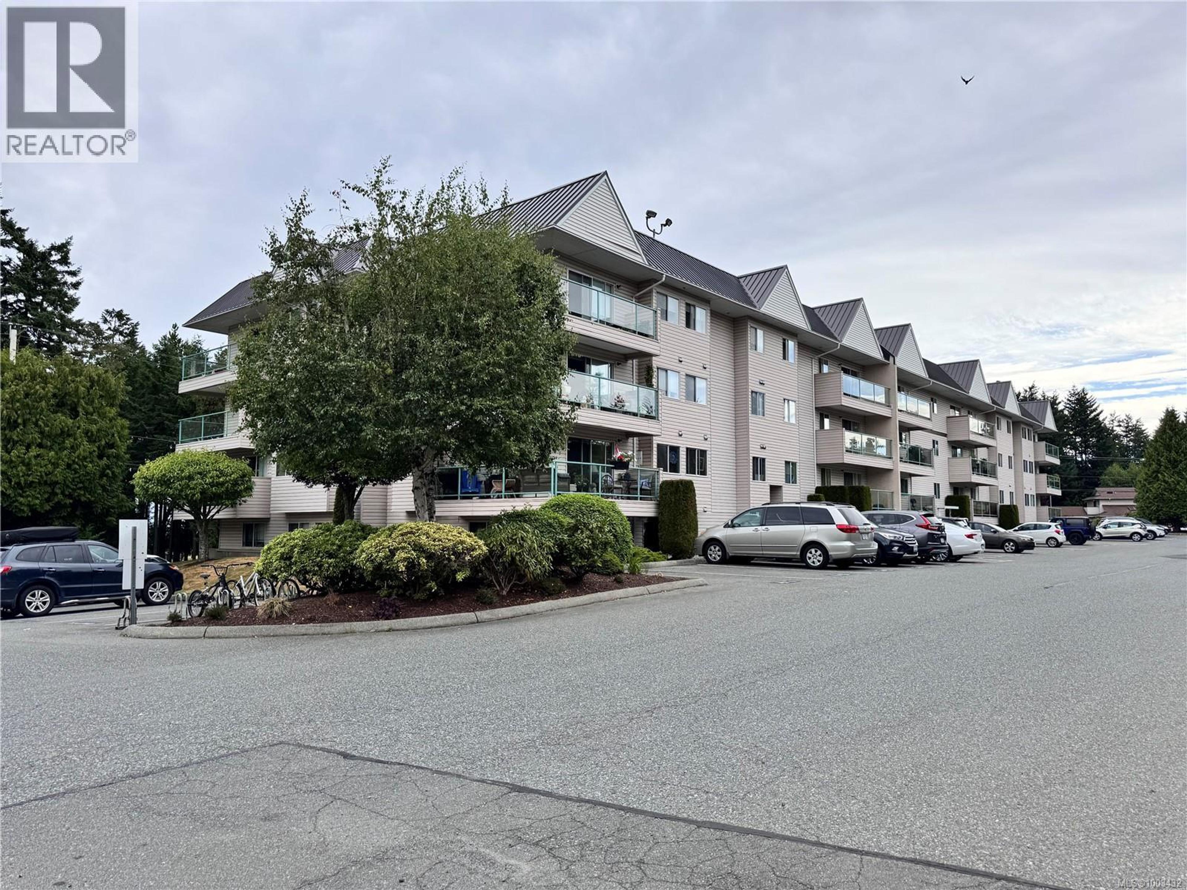 6715 Dover Rd, Nanaimo - Exteriors - Full Complex View - Photo 3