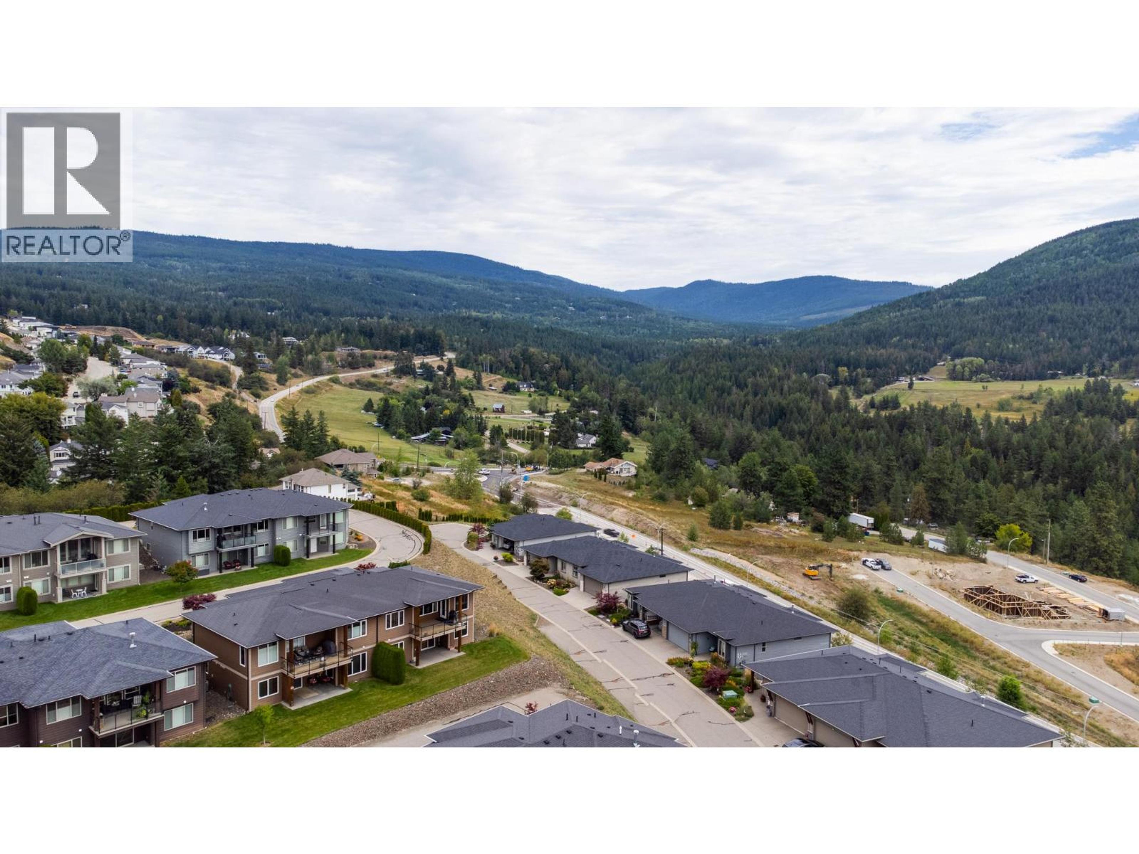1404 Copper Mountain Court, Vernon - Exteriors - Full Complex View, Drone/Aerial View - Photo 1