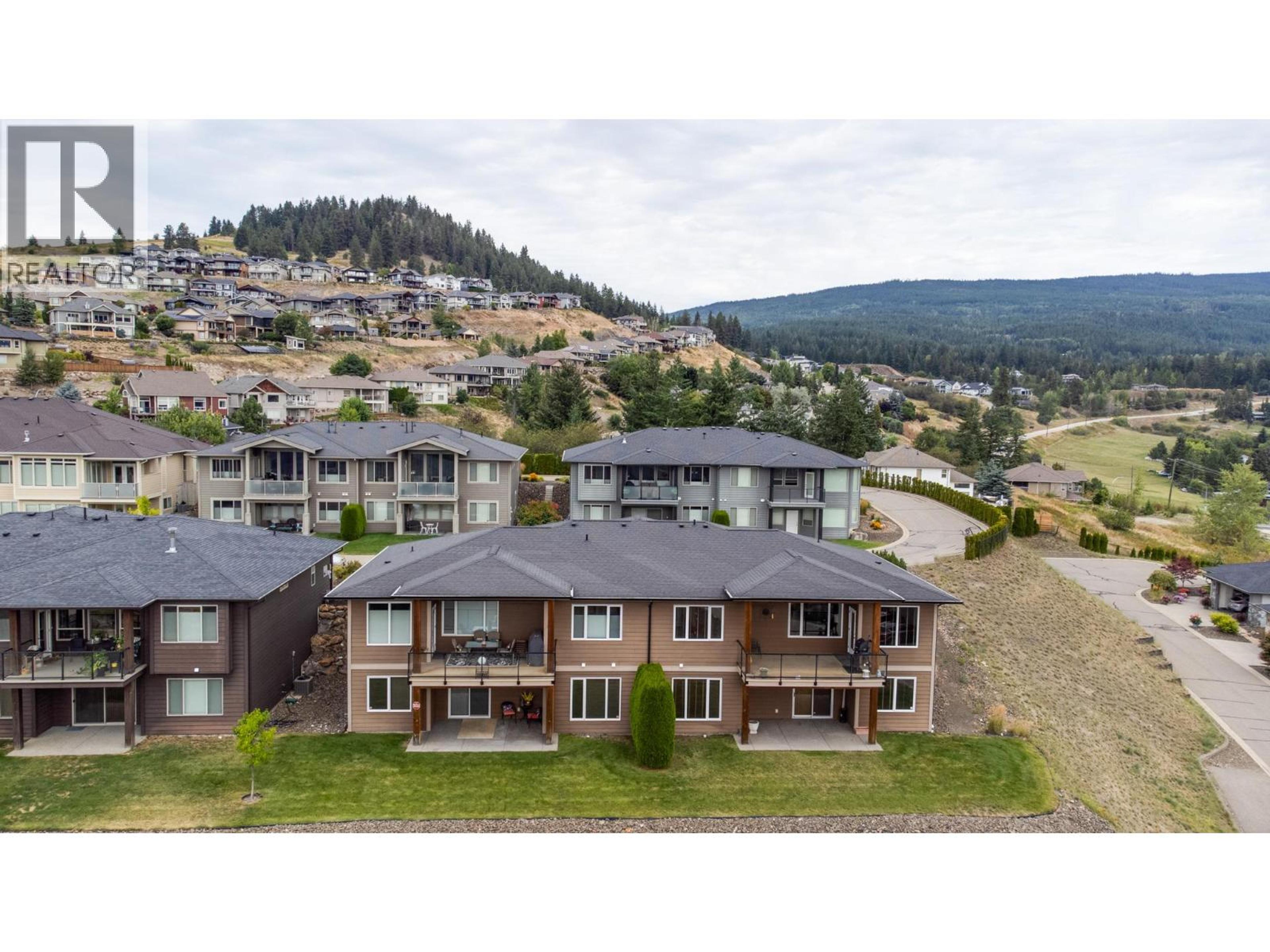 1404 Copper Mountain Court, Vernon - Exteriors - Full Complex View, Drone/Aerial View - Photo 2