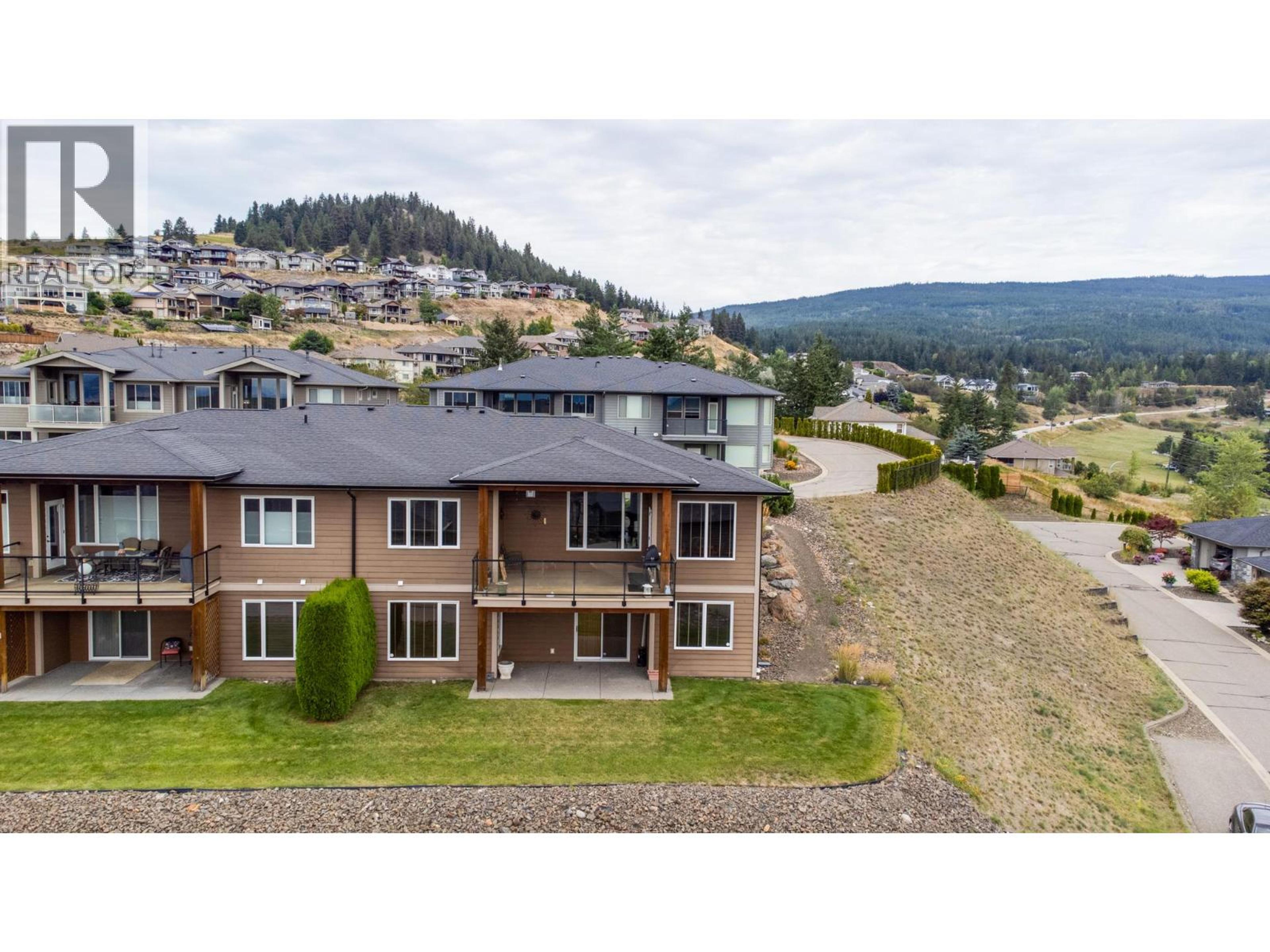 1404 Copper Mountain Court, Vernon - Exteriors - Full Complex View, Drone/Aerial View - Photo 3
