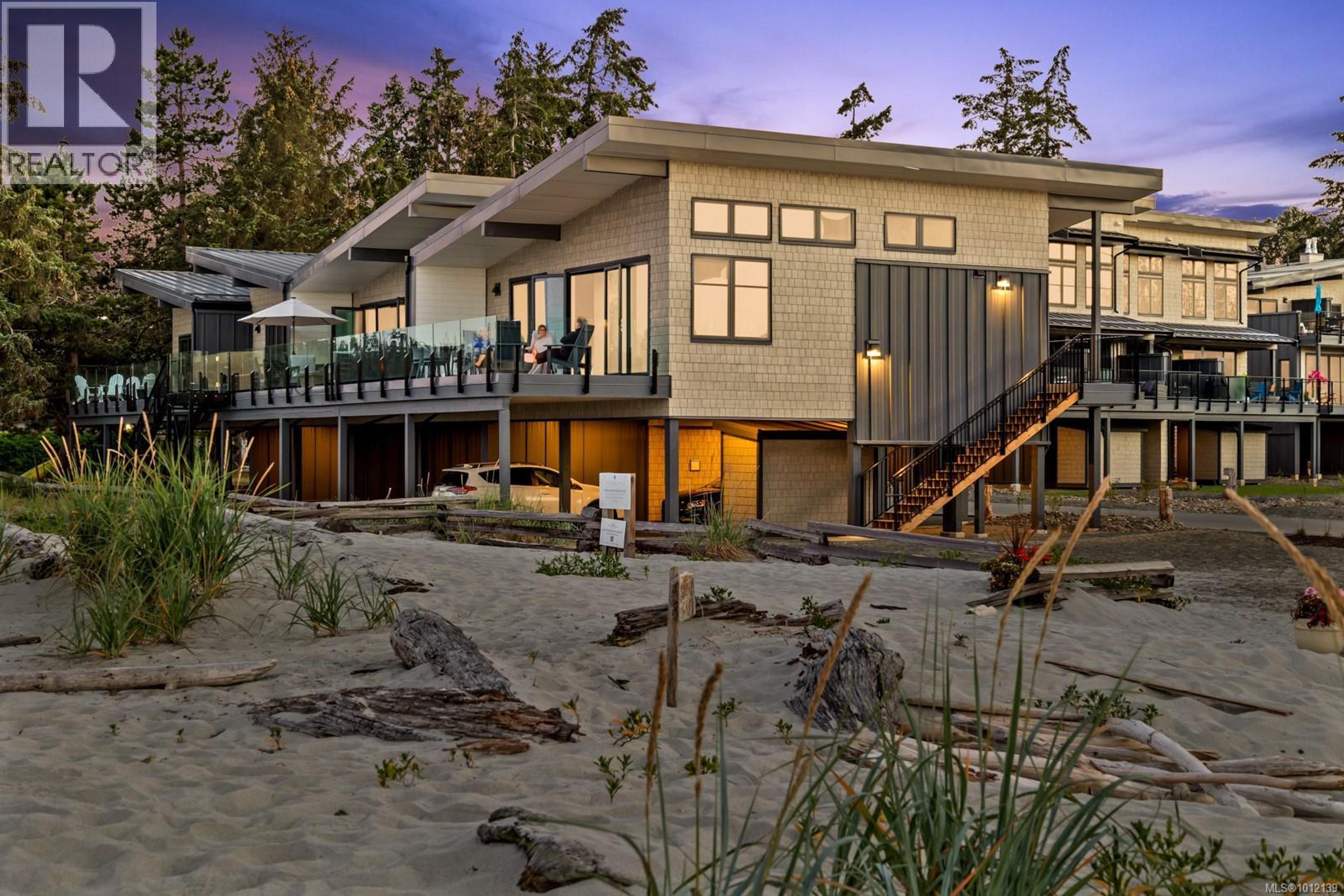 9022 Clarkson Ave, Black Creek - Exteriors - Full Complex View - Photo 1