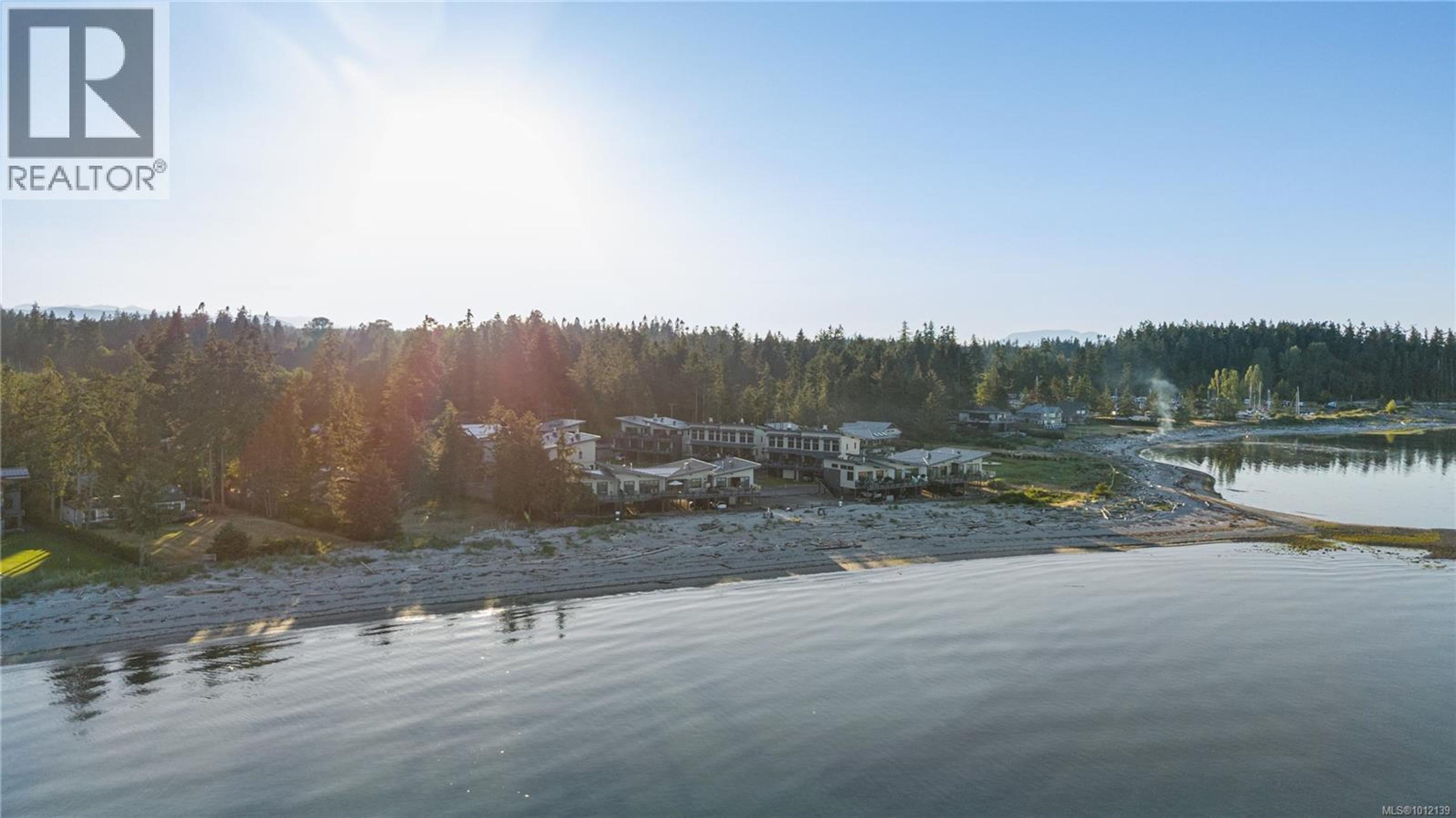 9022 Clarkson Ave, Black Creek - Exteriors - Full Complex View, Drone/Aerial View - Photo 2