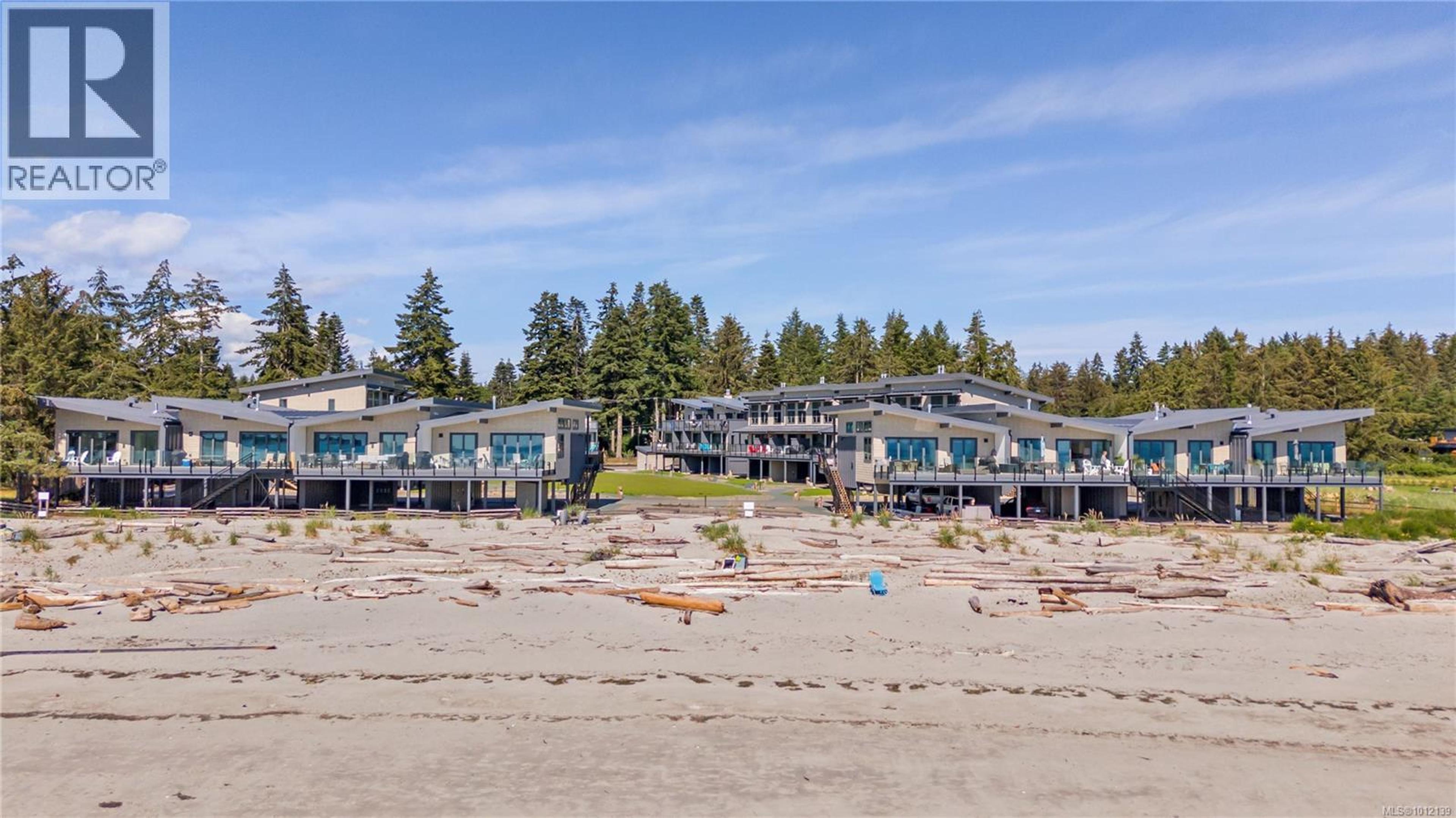 9022 Clarkson Ave, Black Creek - Exteriors - Full Complex View - Photo 5