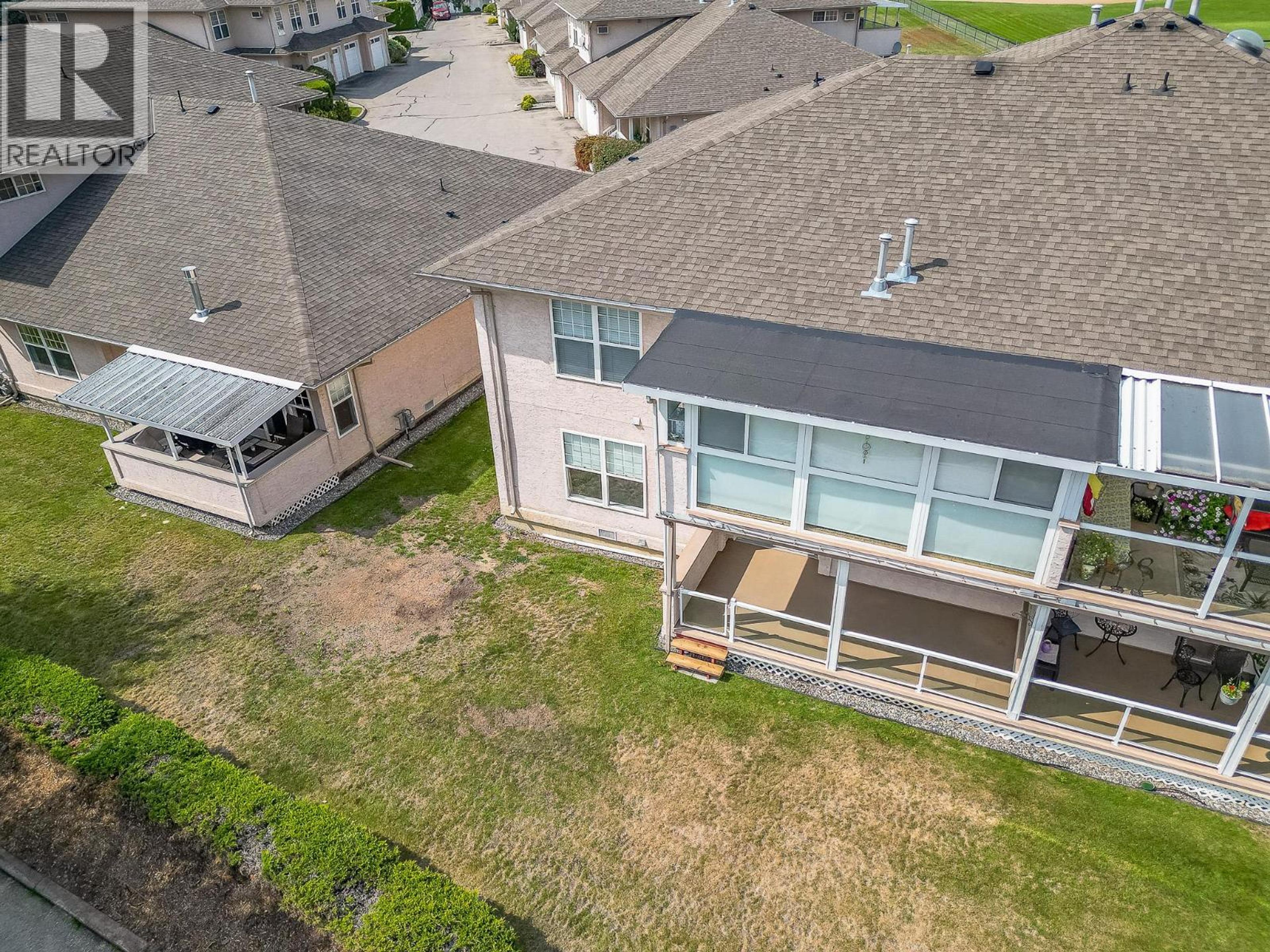303 Regent Avenue, Enderby - Exteriors - Drone/Aerial View, Full Complex View - Photo 7