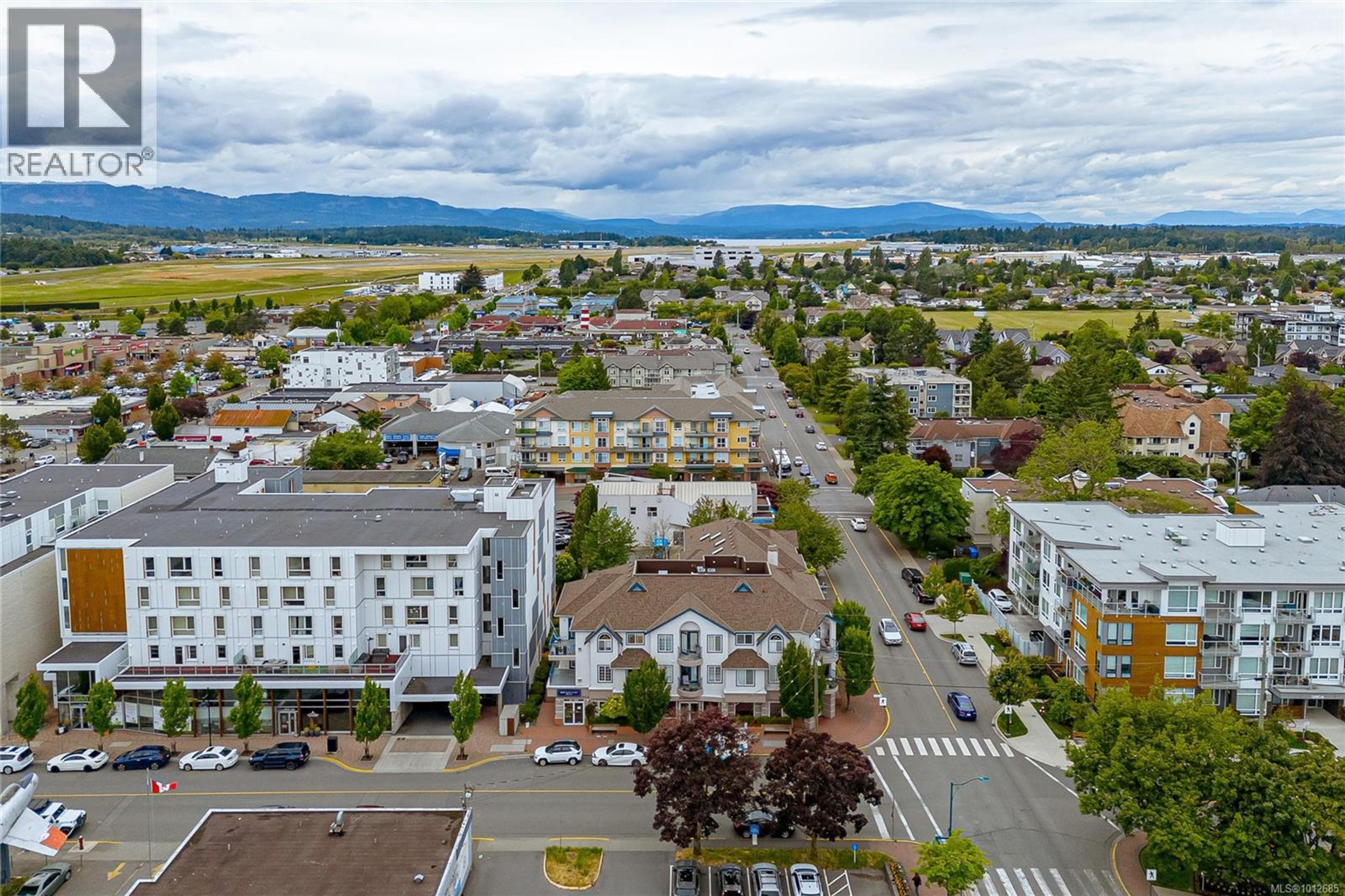 2421 Sidney Ave, Sidney - Exteriors - Full Complex View, Drone/Aerial View - Photo 1