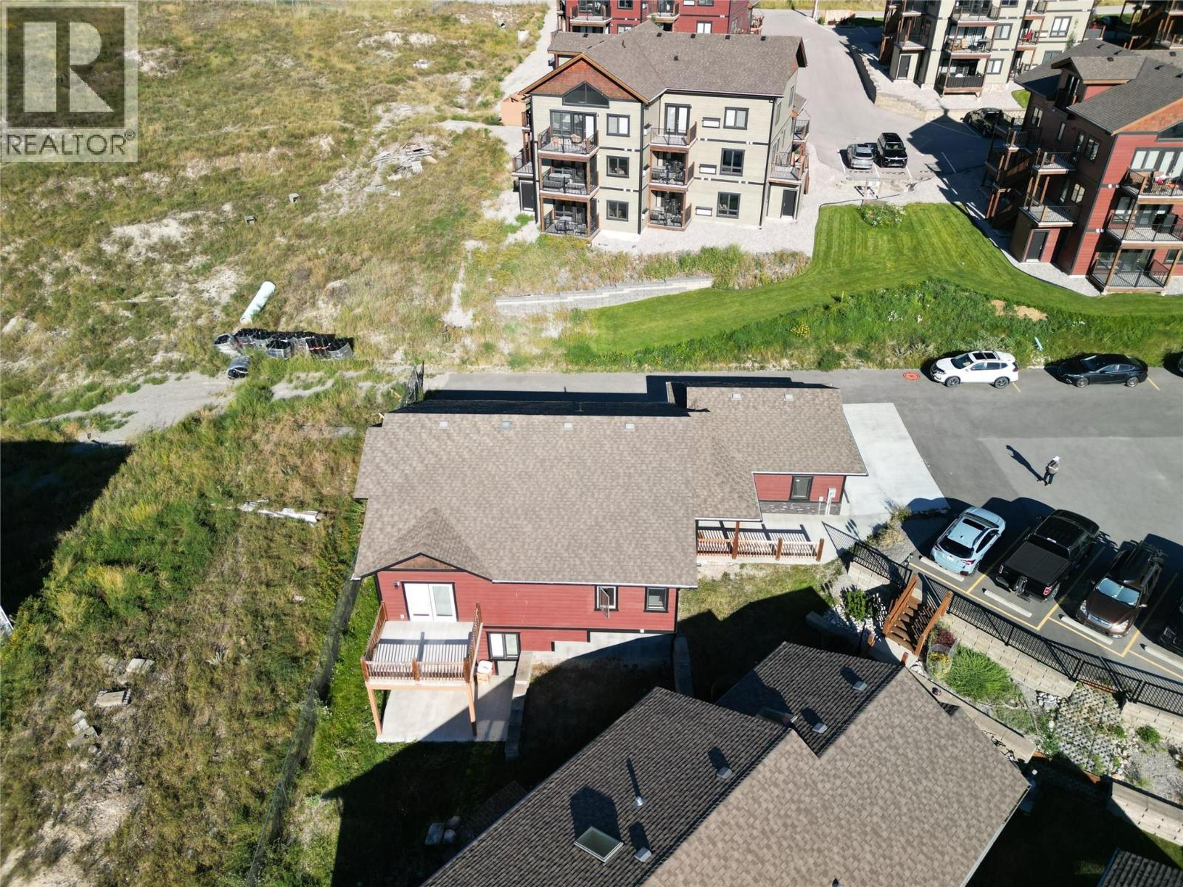 7305 Copperhorn Drive, Radium Hot Springs - Exteriors - Full Complex View, Drone/Aerial View - Photo 7