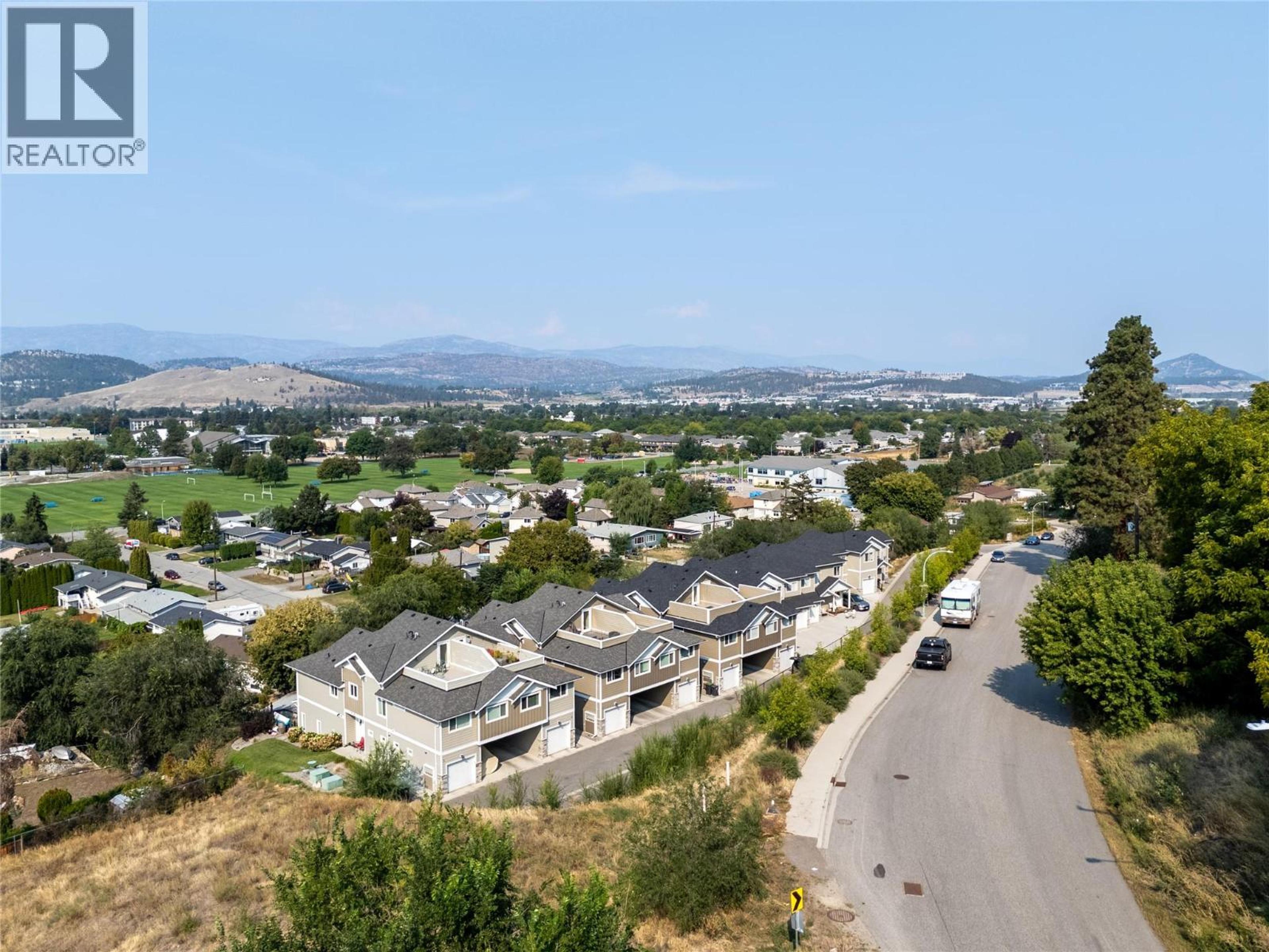 695 Webster Road, Kelowna - Exteriors - Full Complex View, Drone/Aerial View - Photo 5