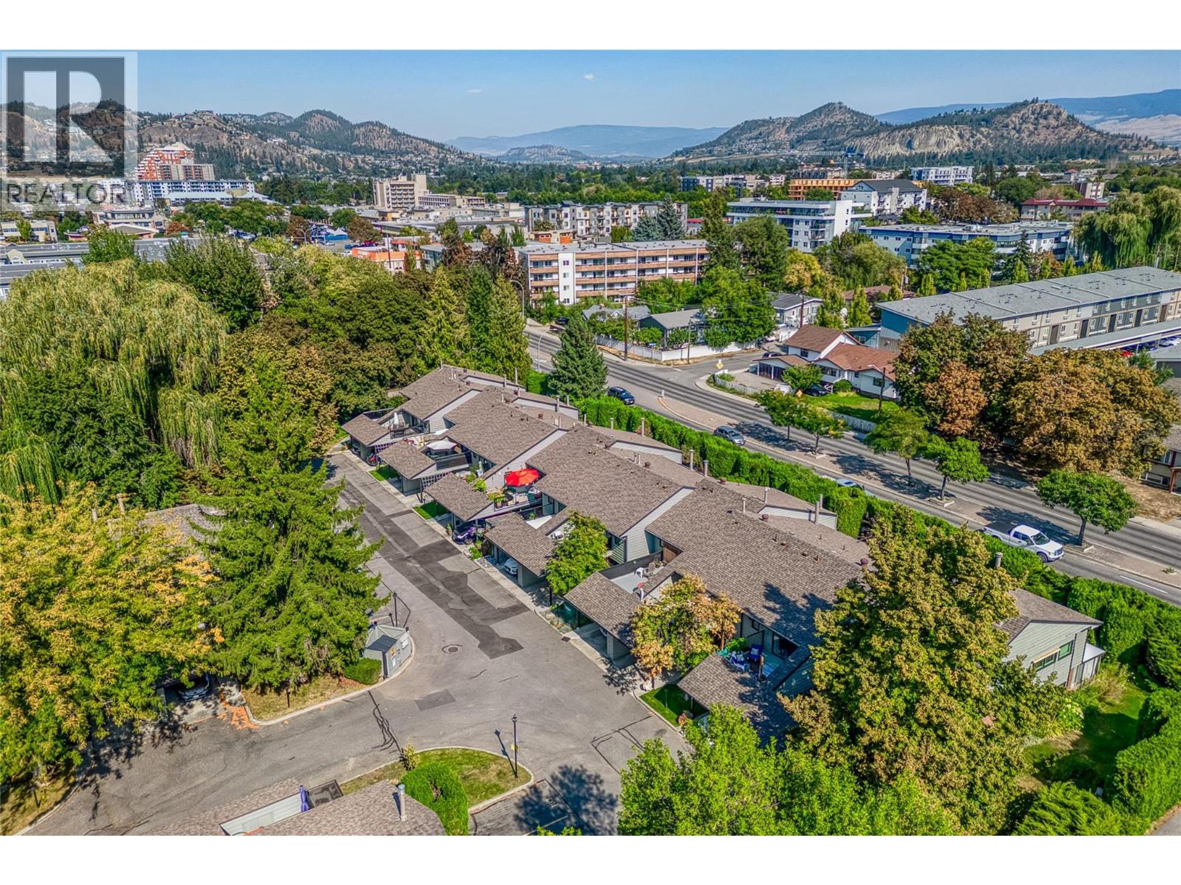 1050 Springfield Road, Kelowna - Exteriors - Full Complex View, Drone/Aerial View - Photo 7