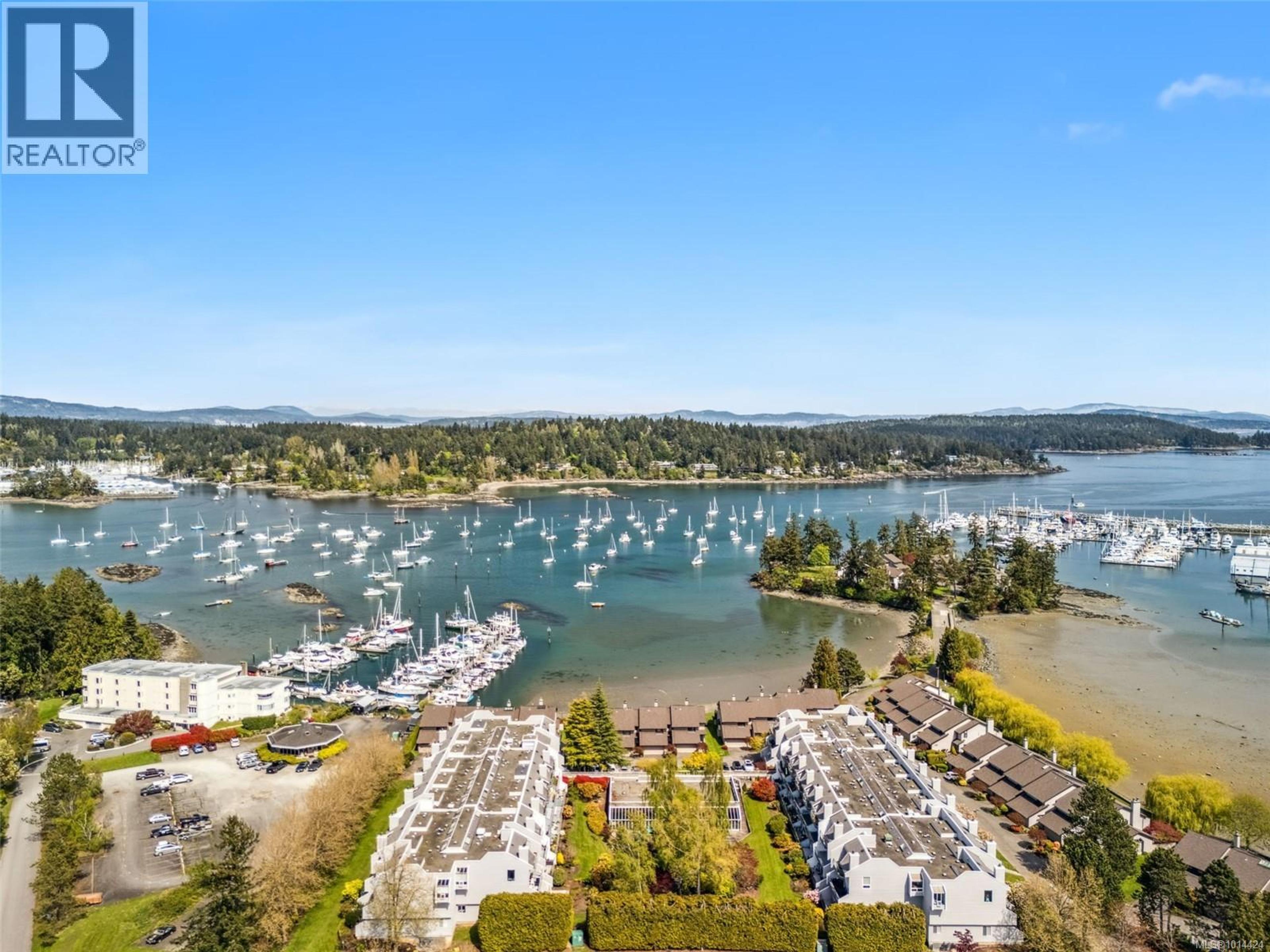 10459 Resthaven Dr, Sidney - Exteriors - Full Complex View, Drone/Aerial View - Photo 1