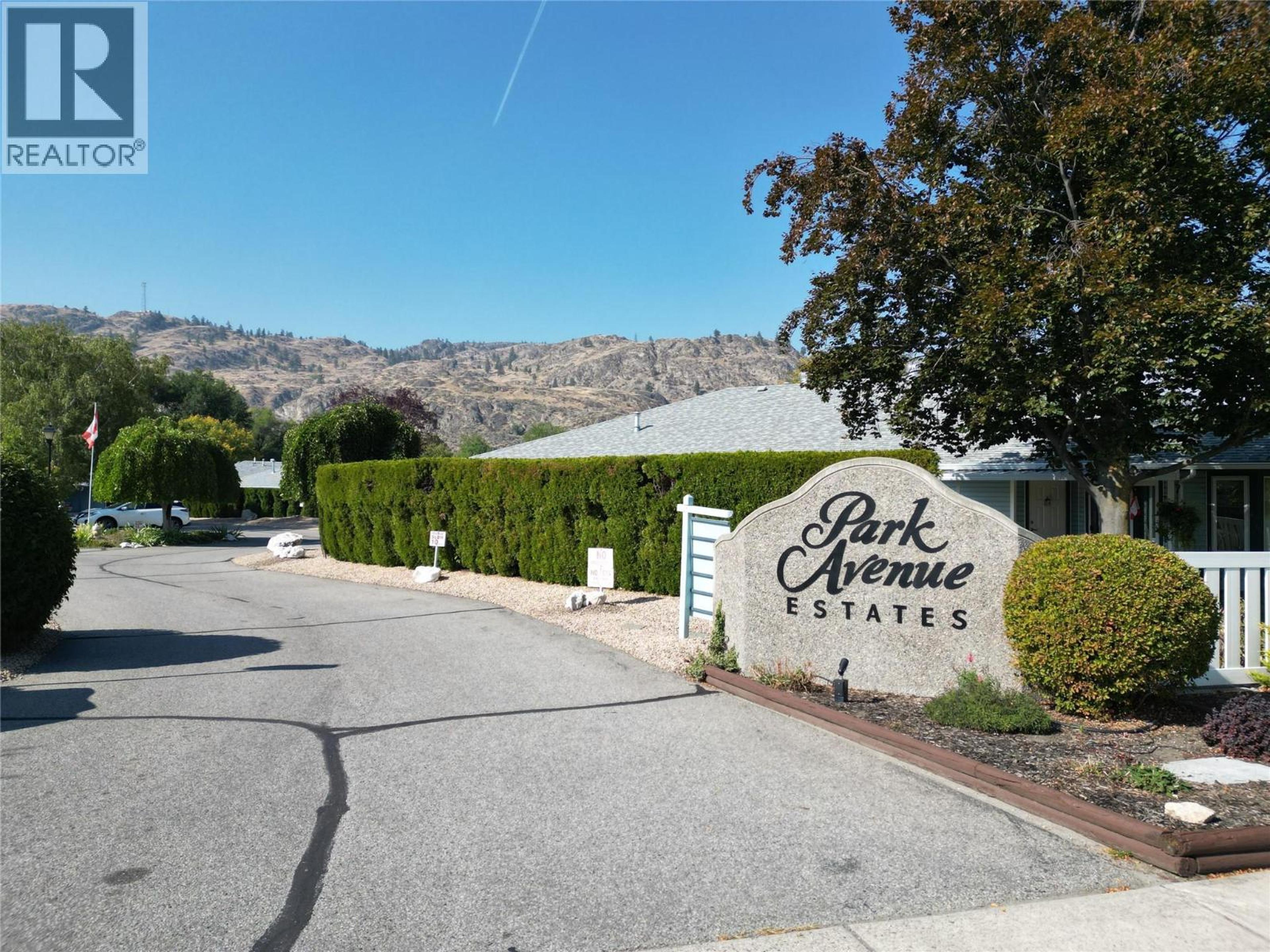 6446 MEADOWS Drive, Oliver - Exteriors - Full Complex View - Photo 1