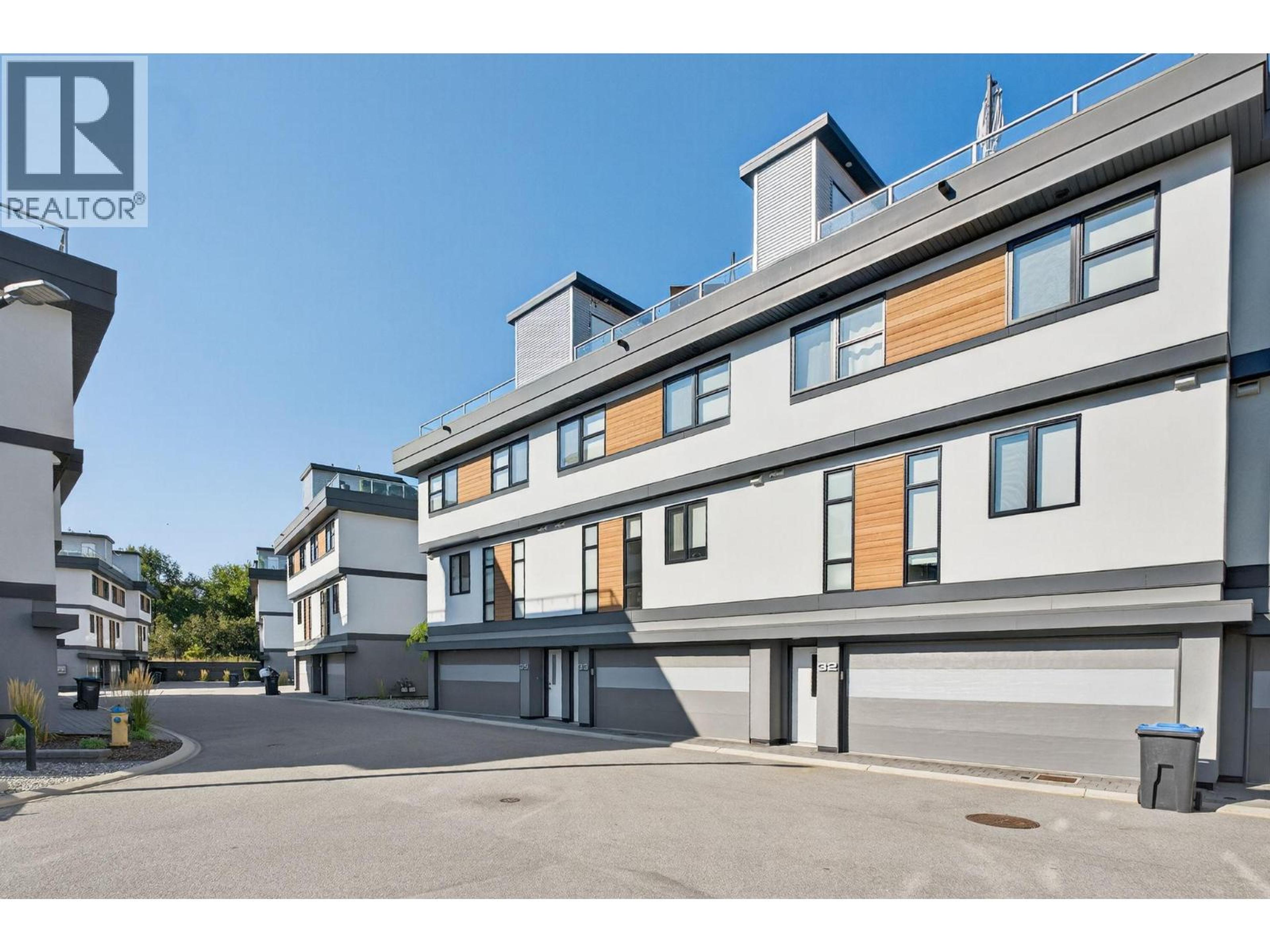 1515 Highland Drive N, Kelowna - Exteriors - Full Complex View - Photo 7