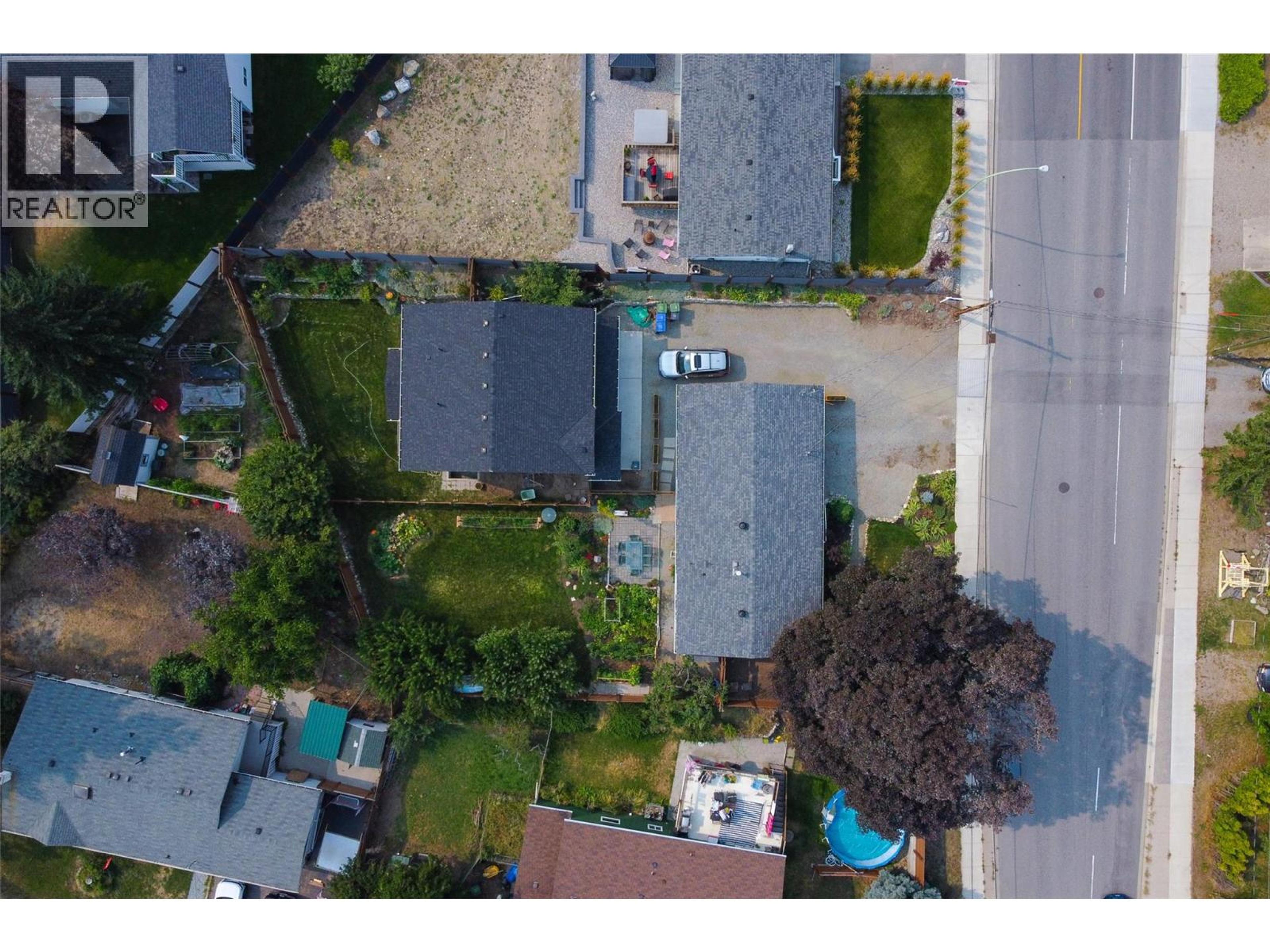 1257 and 1259 Rio Drive, Kelowna - Exteriors - Drone/Aerial View, Full Complex View - Photo 2