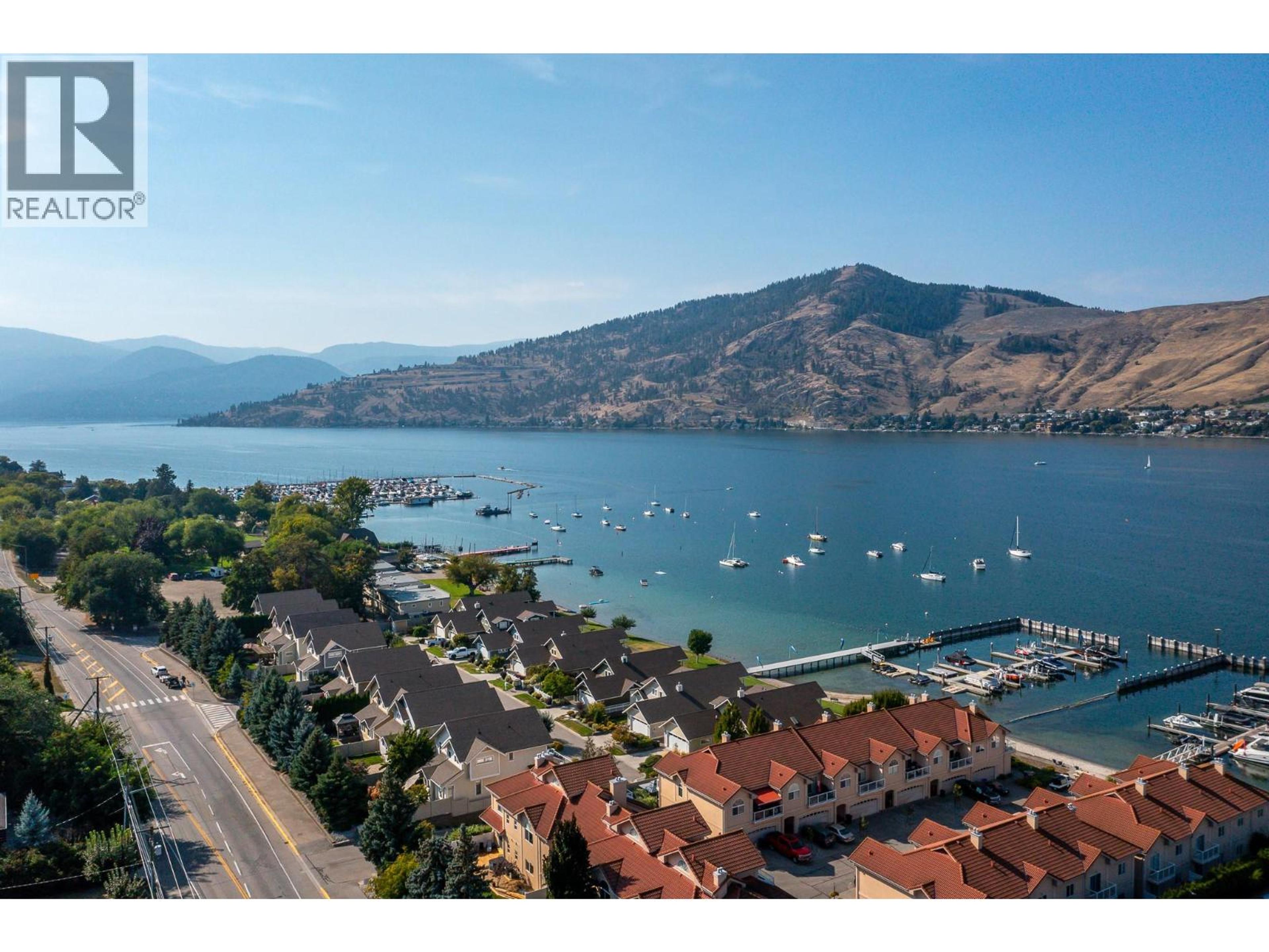 7769 Okanagan Landing Road, Vernon - Exteriors - Full Complex View, Drone/Aerial View - Photo 9