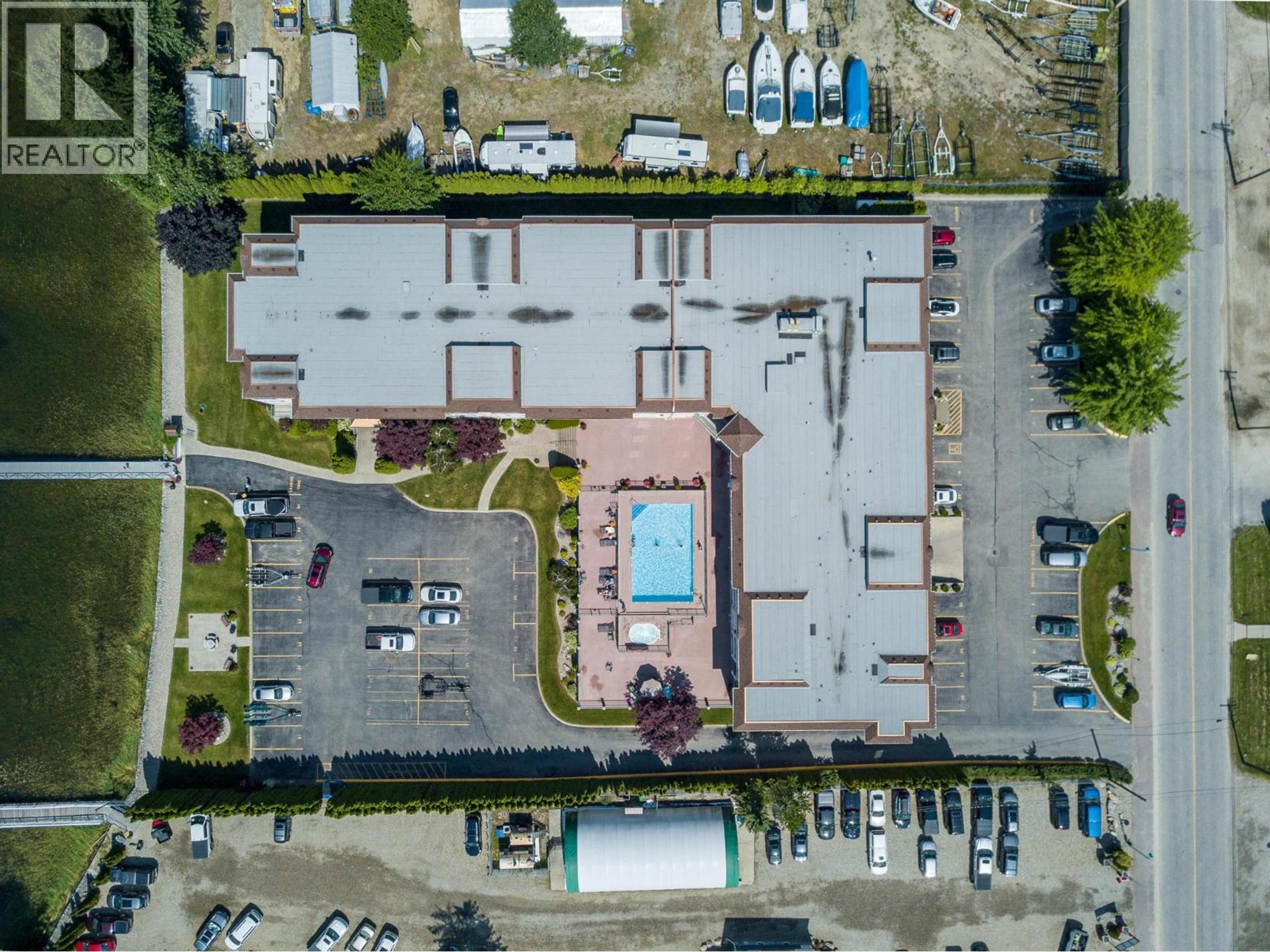 1002 Riverside Avenue, Sicamous - Exteriors - Full Complex View, Drone/Aerial View - Photo 2