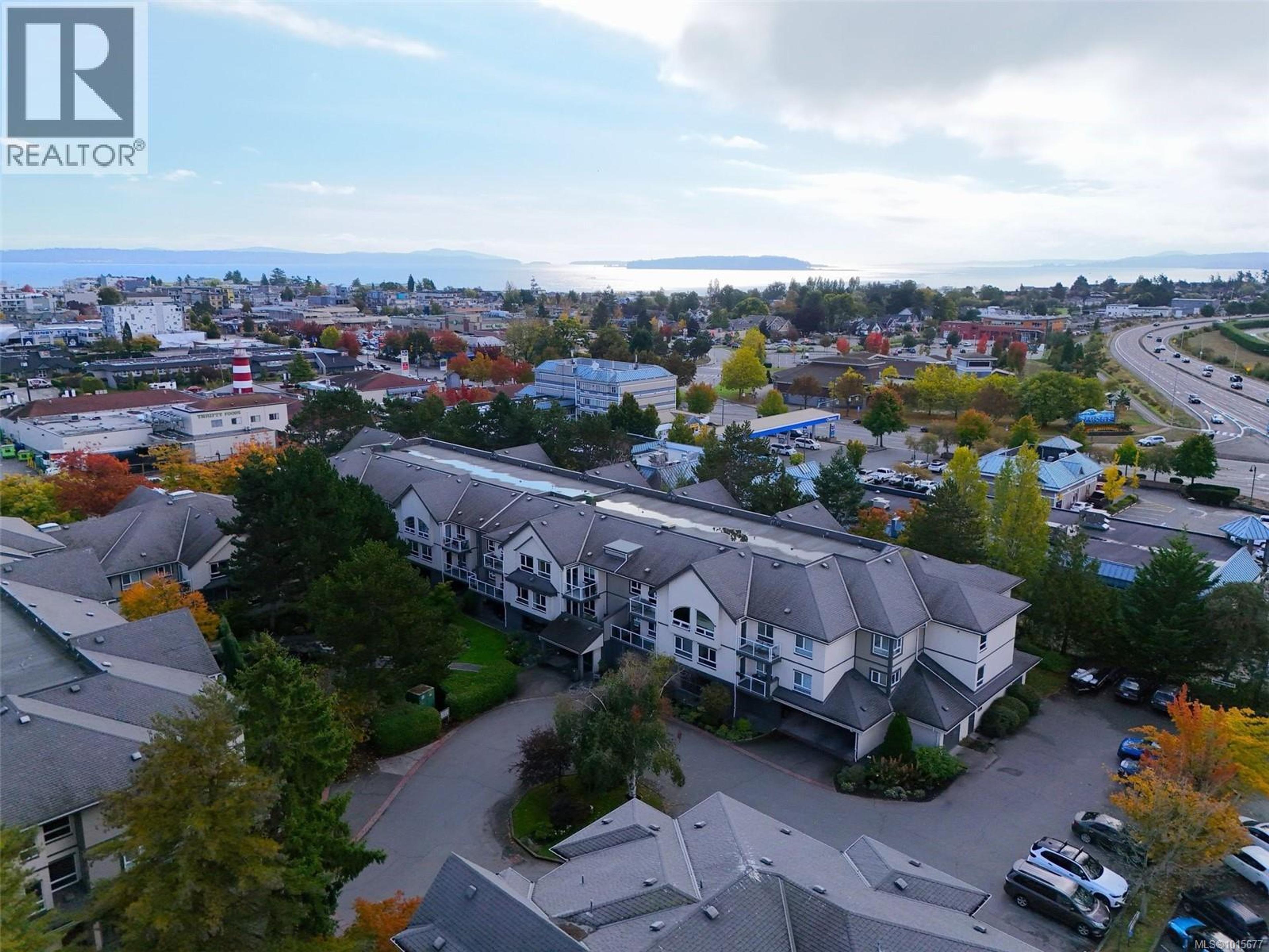 2245 James White Blvd, Sidney - Exteriors - Full Complex View, Drone/Aerial View - Photo 4