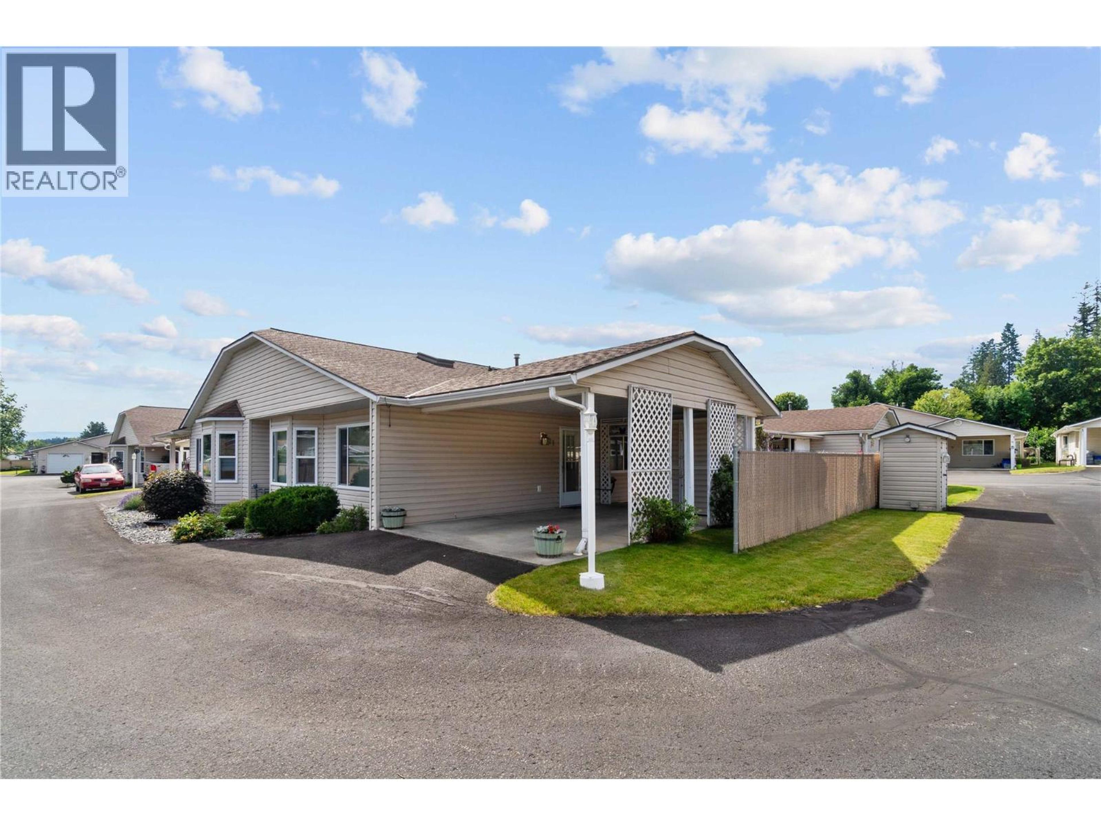 153 Salmon Arm Drive, Enderby - Exteriors - Full Complex View - Photo 6