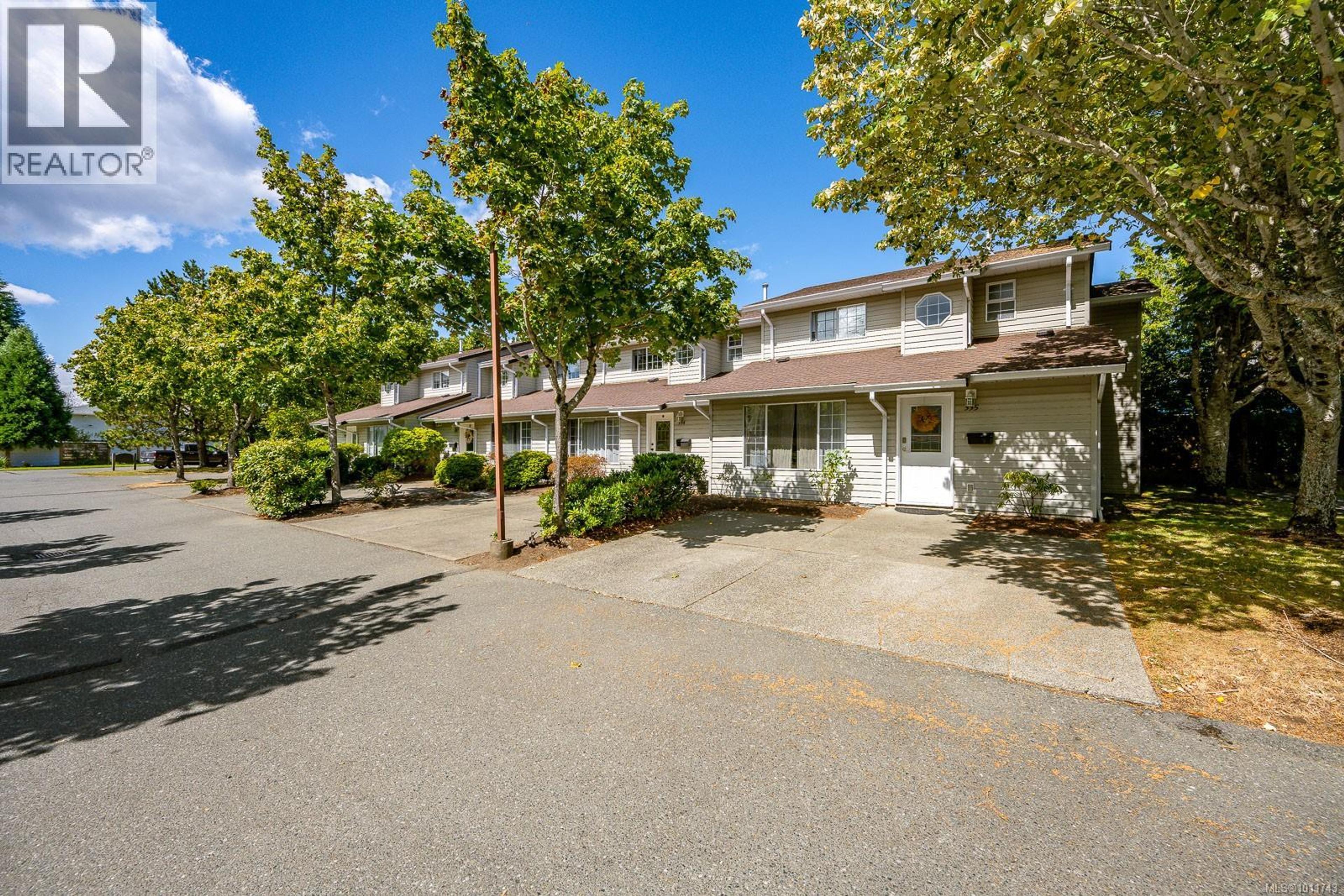 680 Murrelet Dr, Comox - Exteriors - Full Complex View - Photo 1