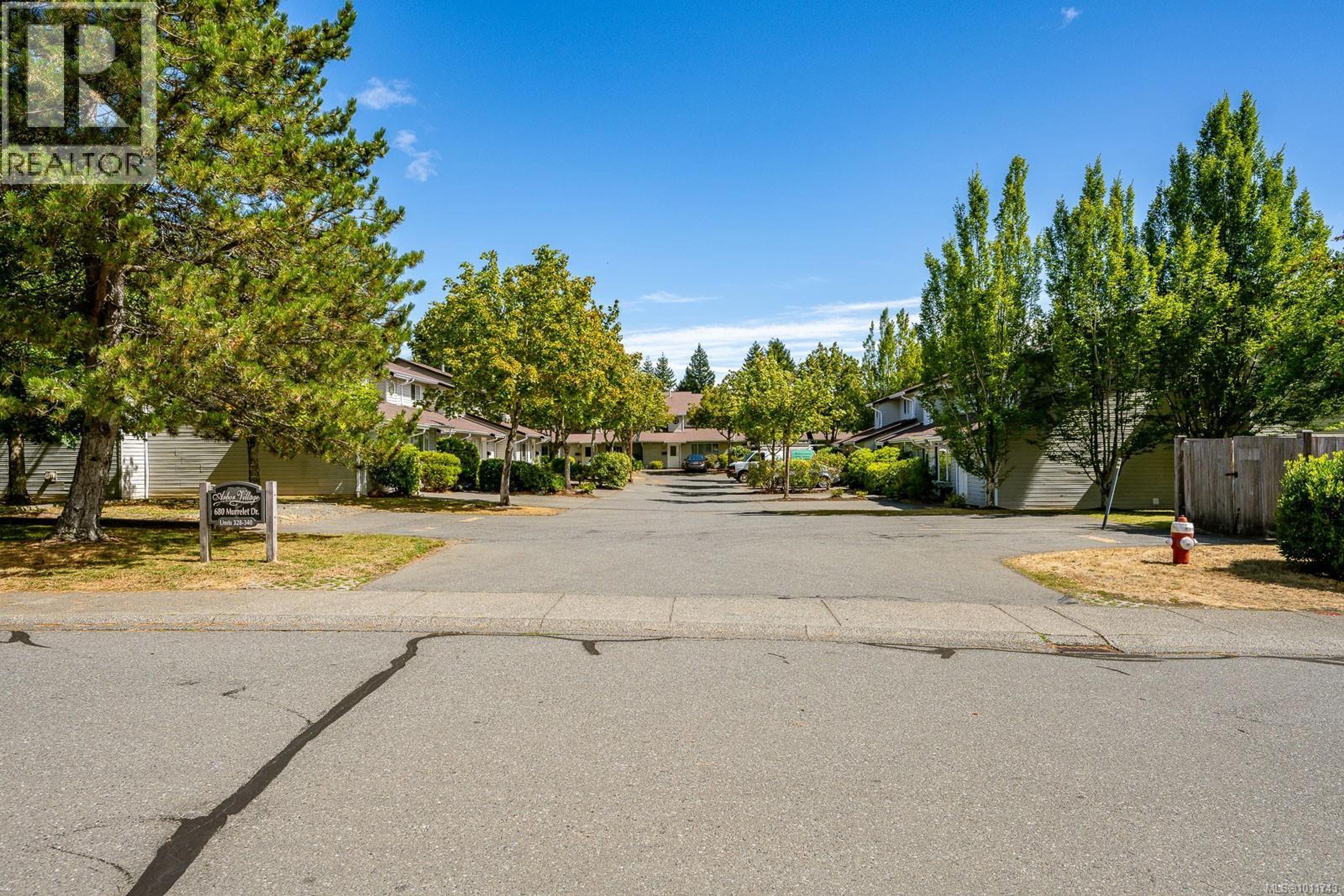 680 Murrelet Dr, Comox - Exteriors - Full Complex View - Photo 4