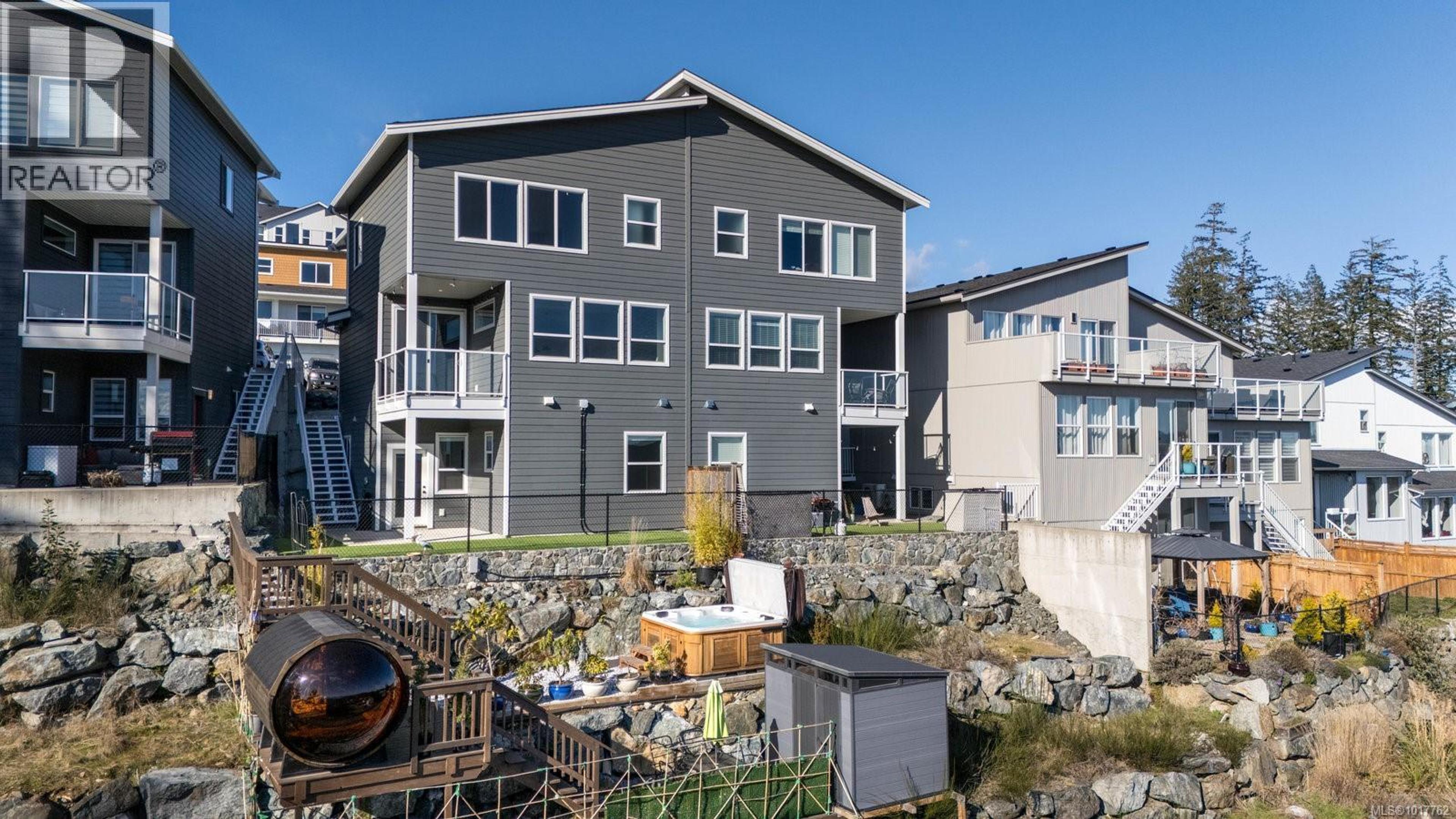 7041 Brailsford Pl, Sooke - Exteriors - Full Complex View - Photo 3