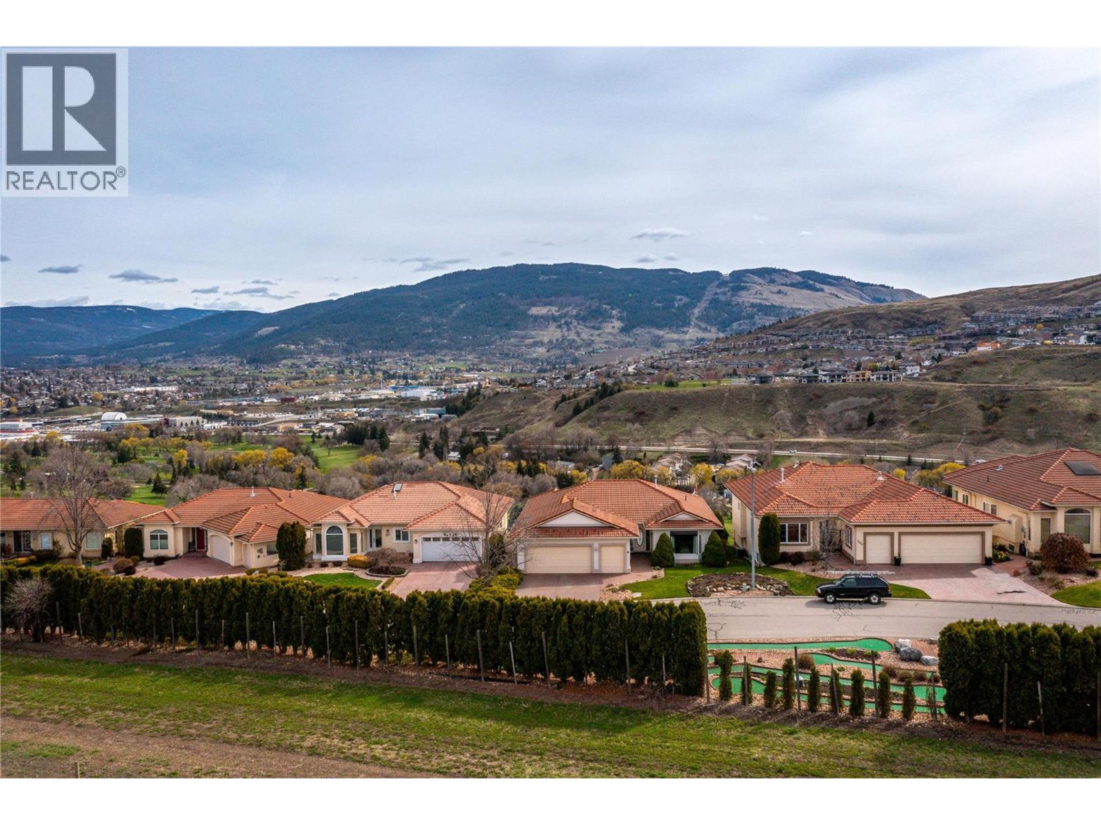 305 Country Estate Place, Vernon - Exteriors - Full Complex View, Drone/Aerial View - Photo 2