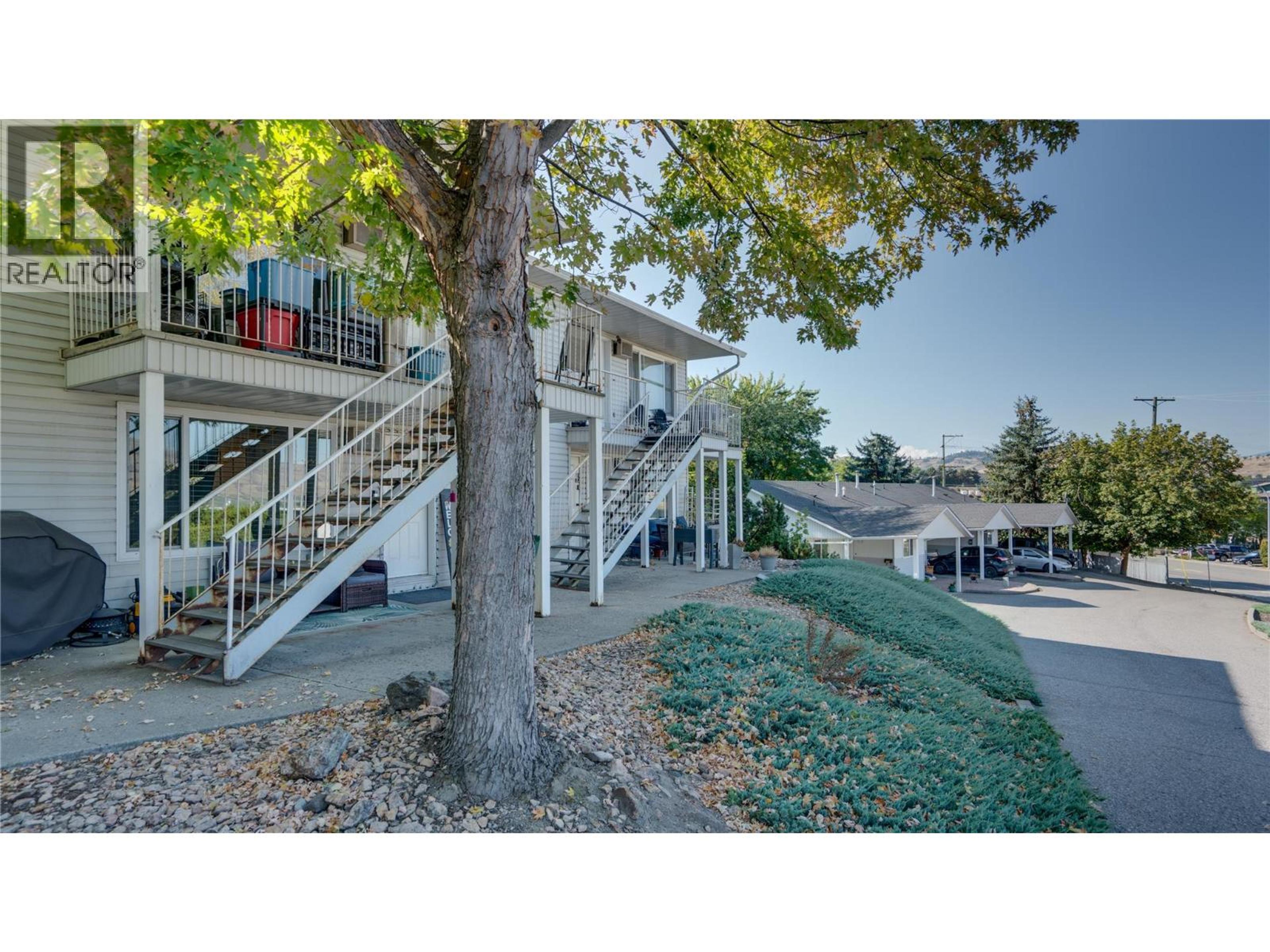 1041 Middleton Way, Vernon - Exteriors - Full Complex View - Photo 3