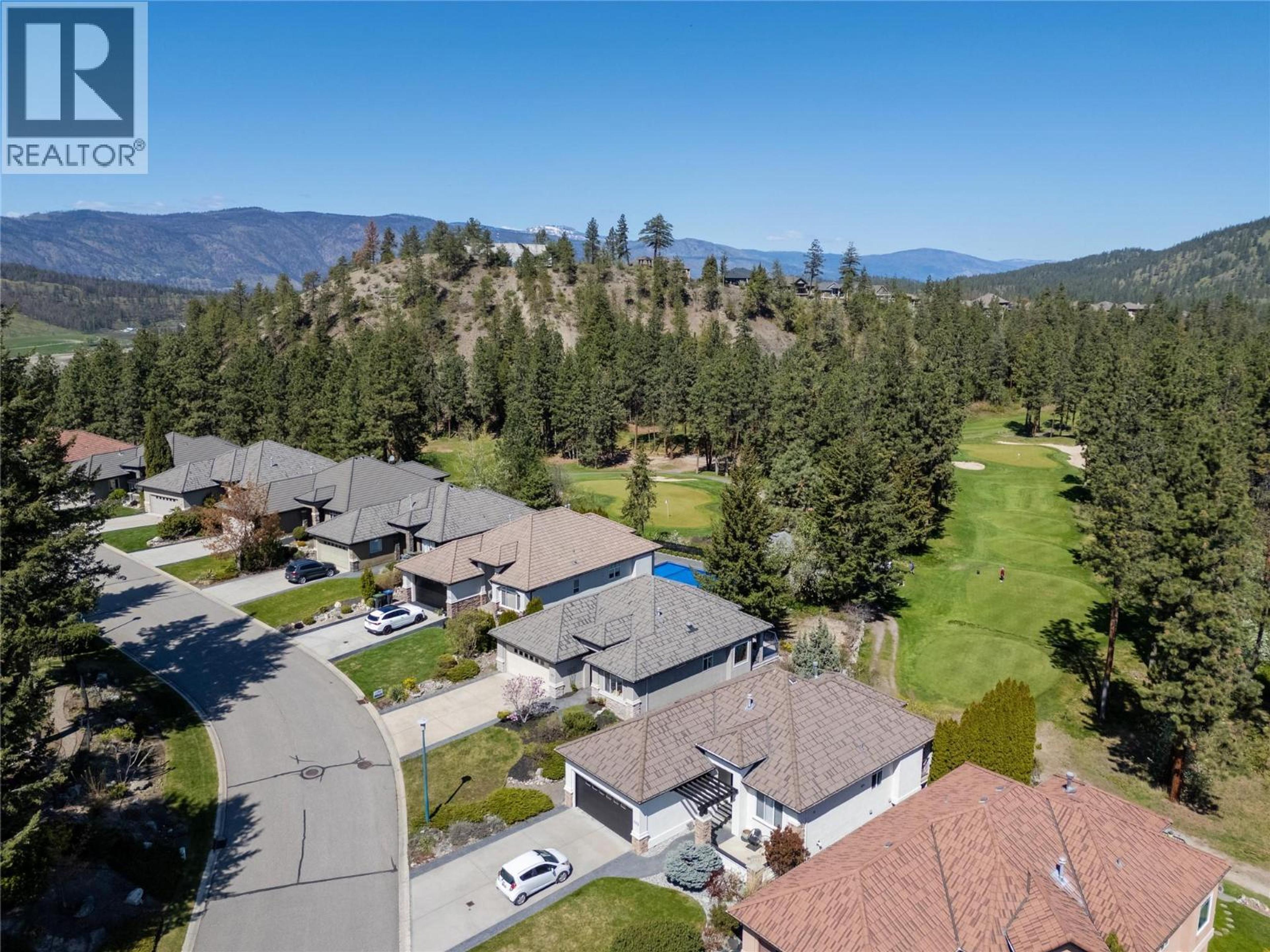 1950 Capistrano Drive, Kelowna - Exteriors - Full Complex View, Drone/Aerial View - Photo 1